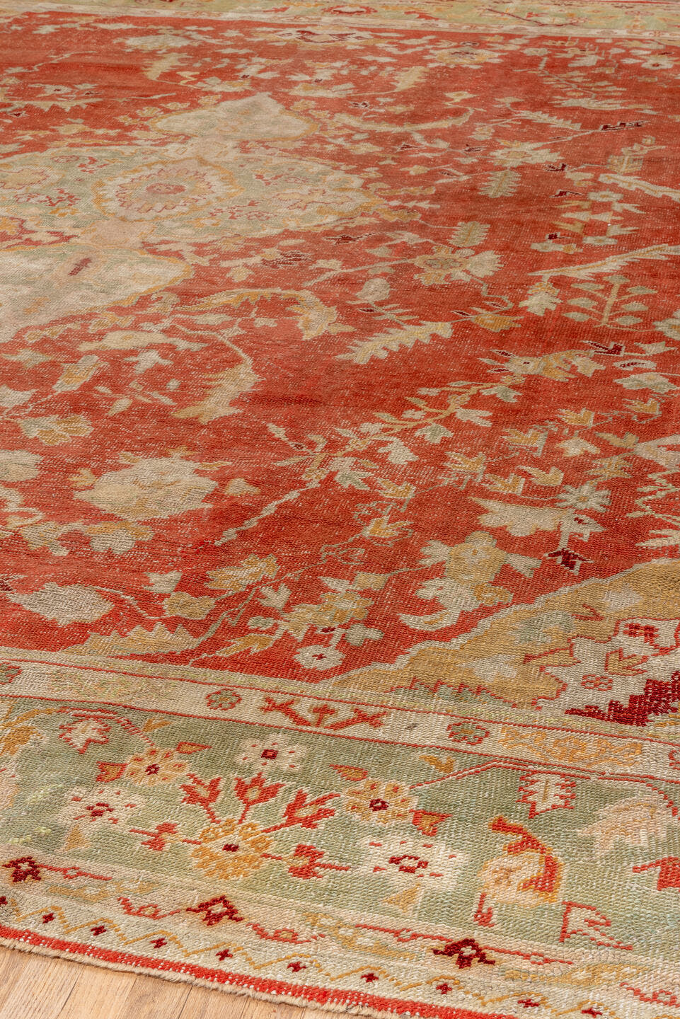 13' x 15' one-of-a-kind handmade antique Oushak oversize rug. Color palette: rust, ivory, sage, gold, terra cotta, beige