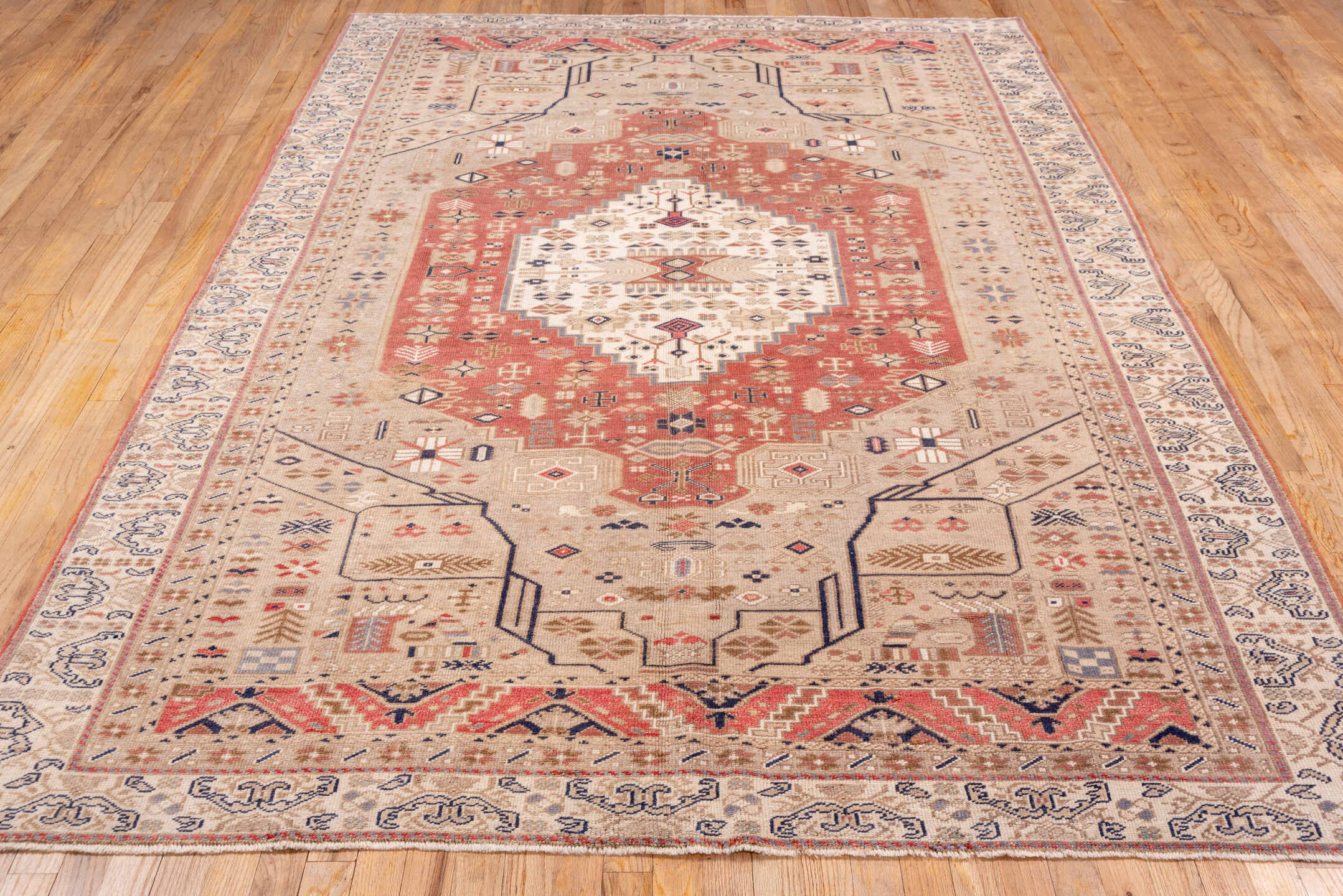 6' x 9' one-of-a-kind handmade vintage Oushak medium size rug. Color palette: ivory, blush, sand, muted blue, taupe