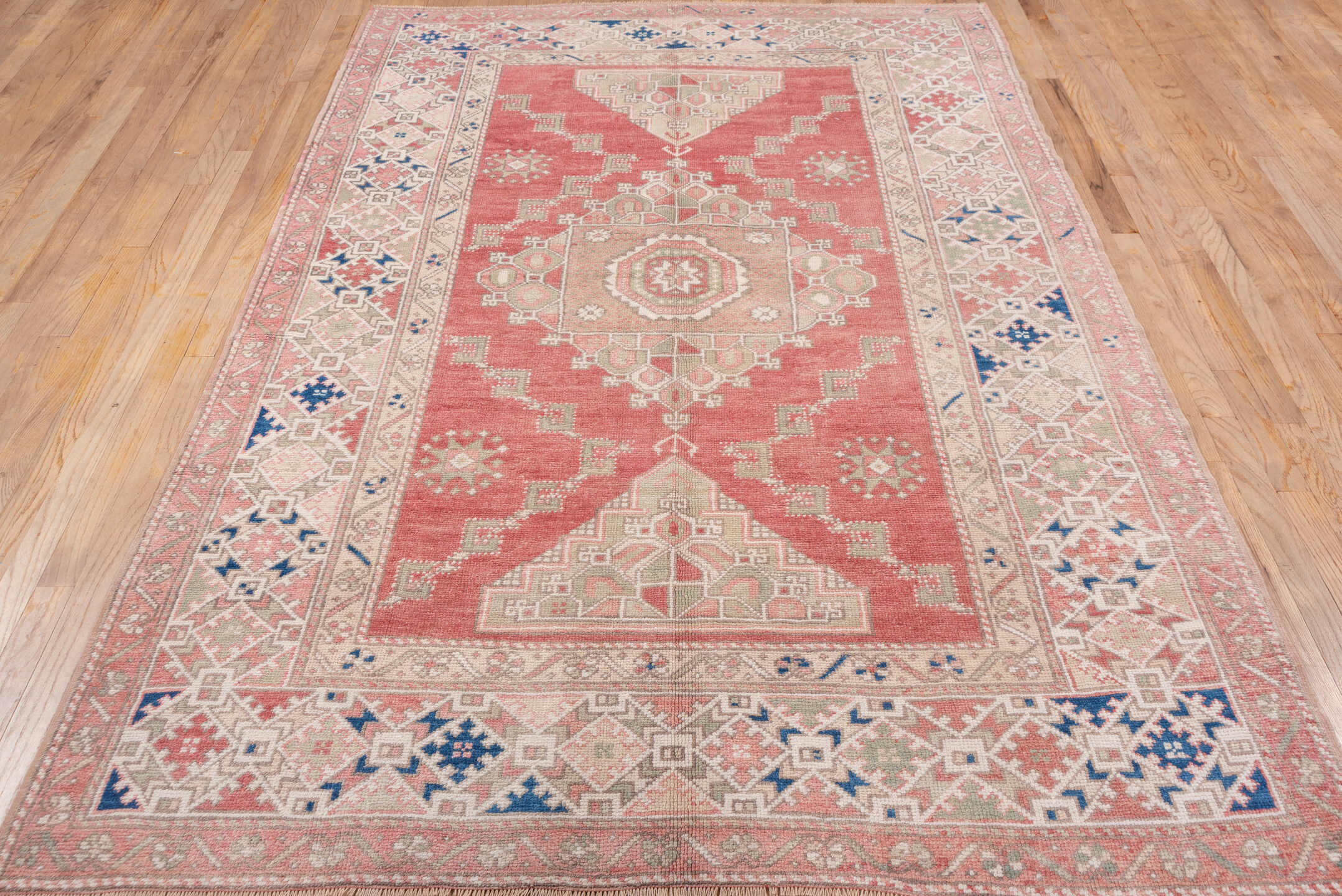 5' x 8' one-of-a-kind handmade vintage Oushak medium size rug. Color palette: coral, ivory, taupe, dusty rose, blue, sage