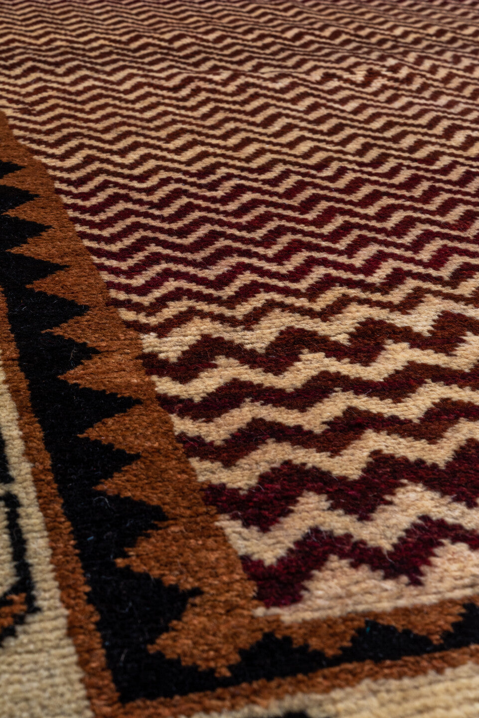 3' x 6' one-of-a-kind handmade vintage Gabbe small size rug. Color palette: black, brown, gray, off-white, orange, pink, red