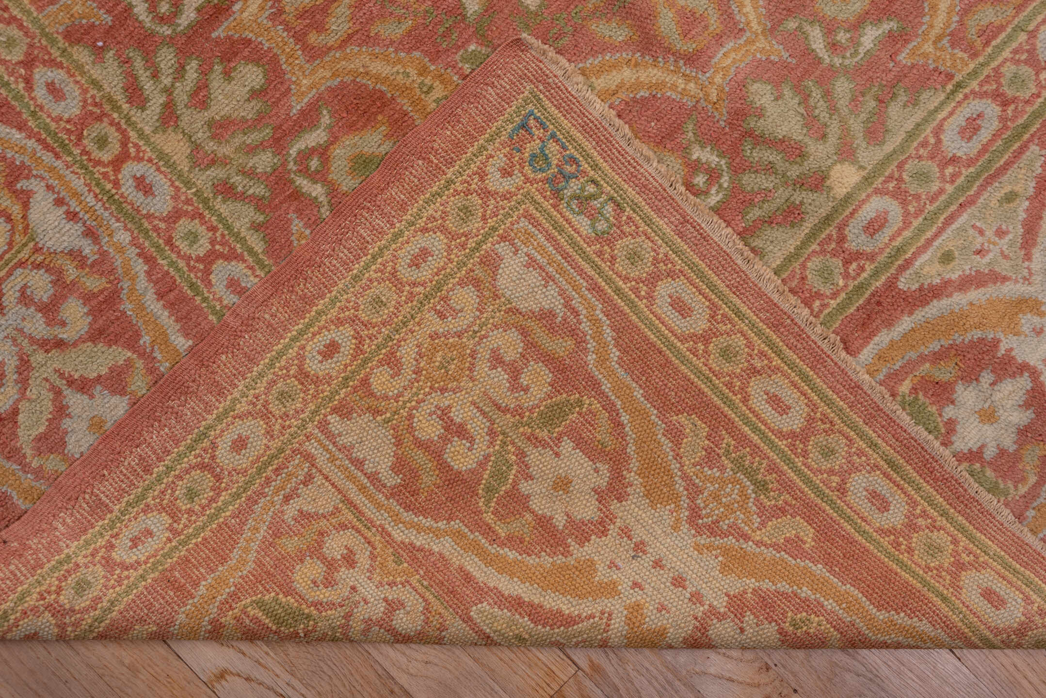 10' x 20' one-of-a-kind handmade antique Spanish rug. Color palette: coral, ivory, gold, sage, terra cotta, terracotta