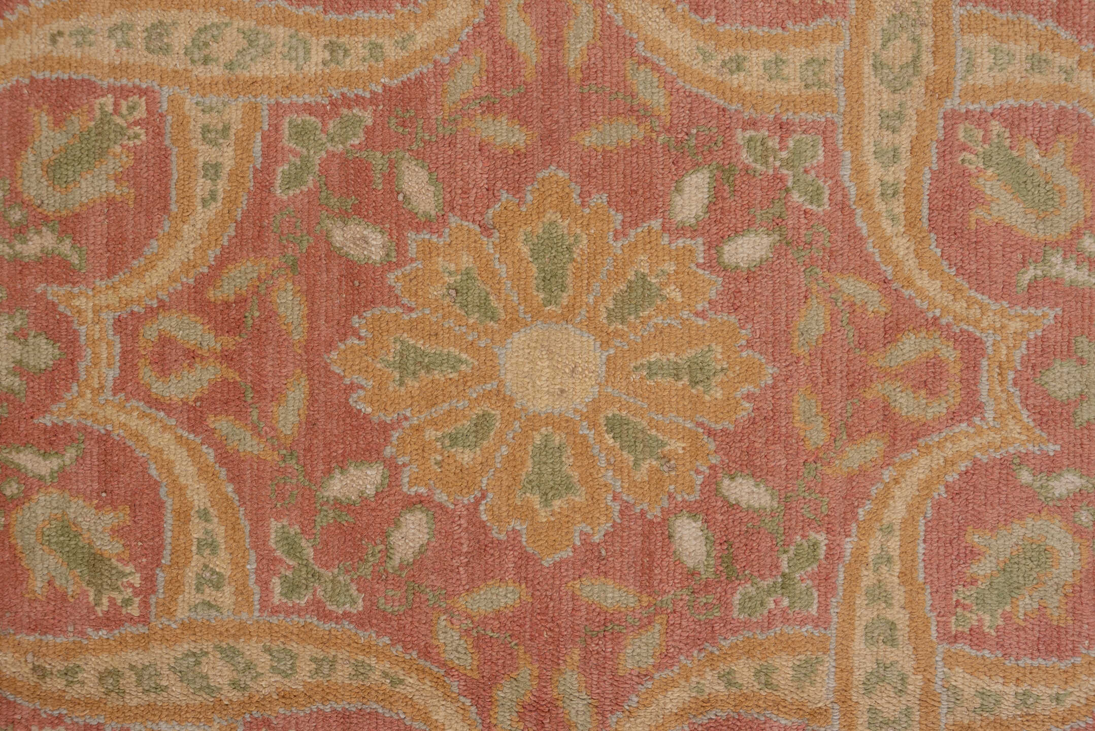 10' x 20' one-of-a-kind handmade antique Spanish rug. Color palette: coral, ivory, gold, sage, terra cotta, terracotta
