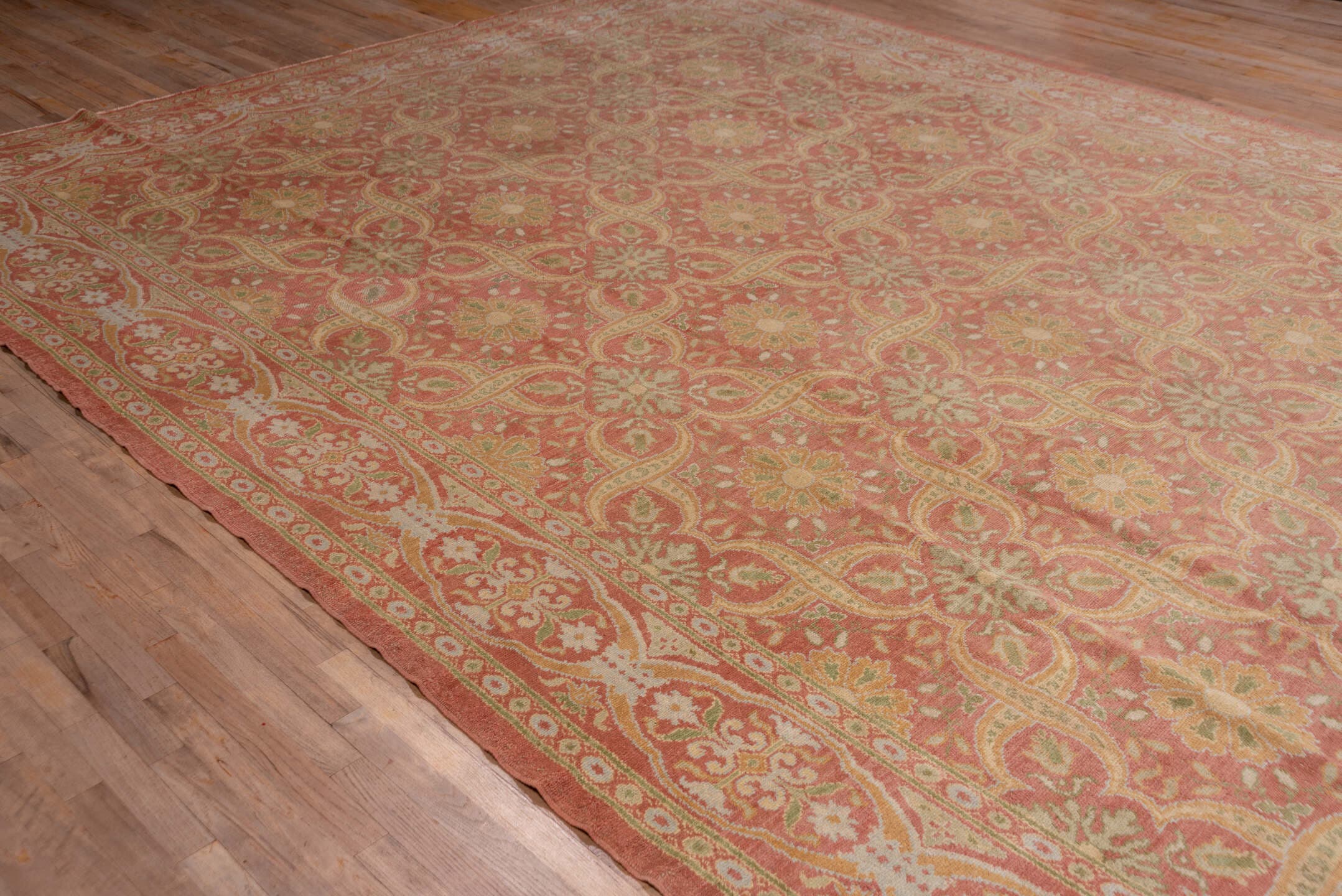 10' x 20' one-of-a-kind handmade antique Spanish rug. Color palette: coral, ivory, gold, sage, terra cotta, terracotta