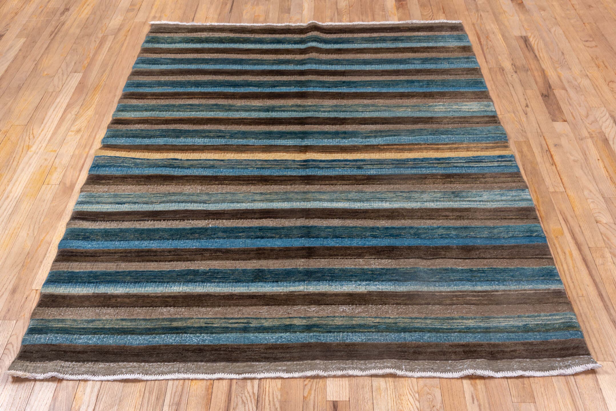 4' x 6' one-of-a-kind handmade vintage Afghan small size rug. Color palette: taupe, teal, sky blue, slate, brown, camel
