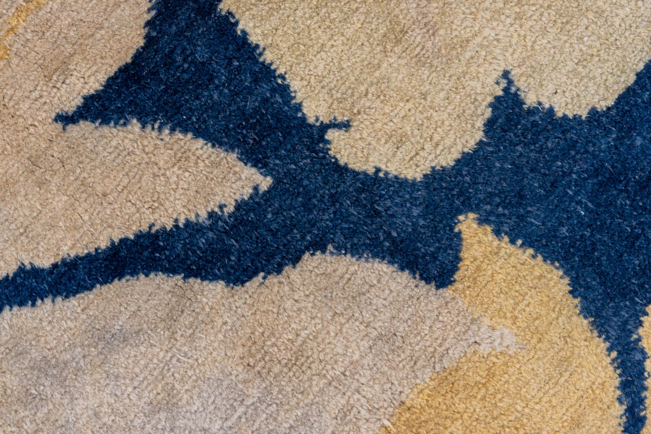 8' x 9' one-of-a-kind handmade vintage Tibetan rug. Color palette: navy, ivory, cream, taupe, slate, gold, blue, beige, gray