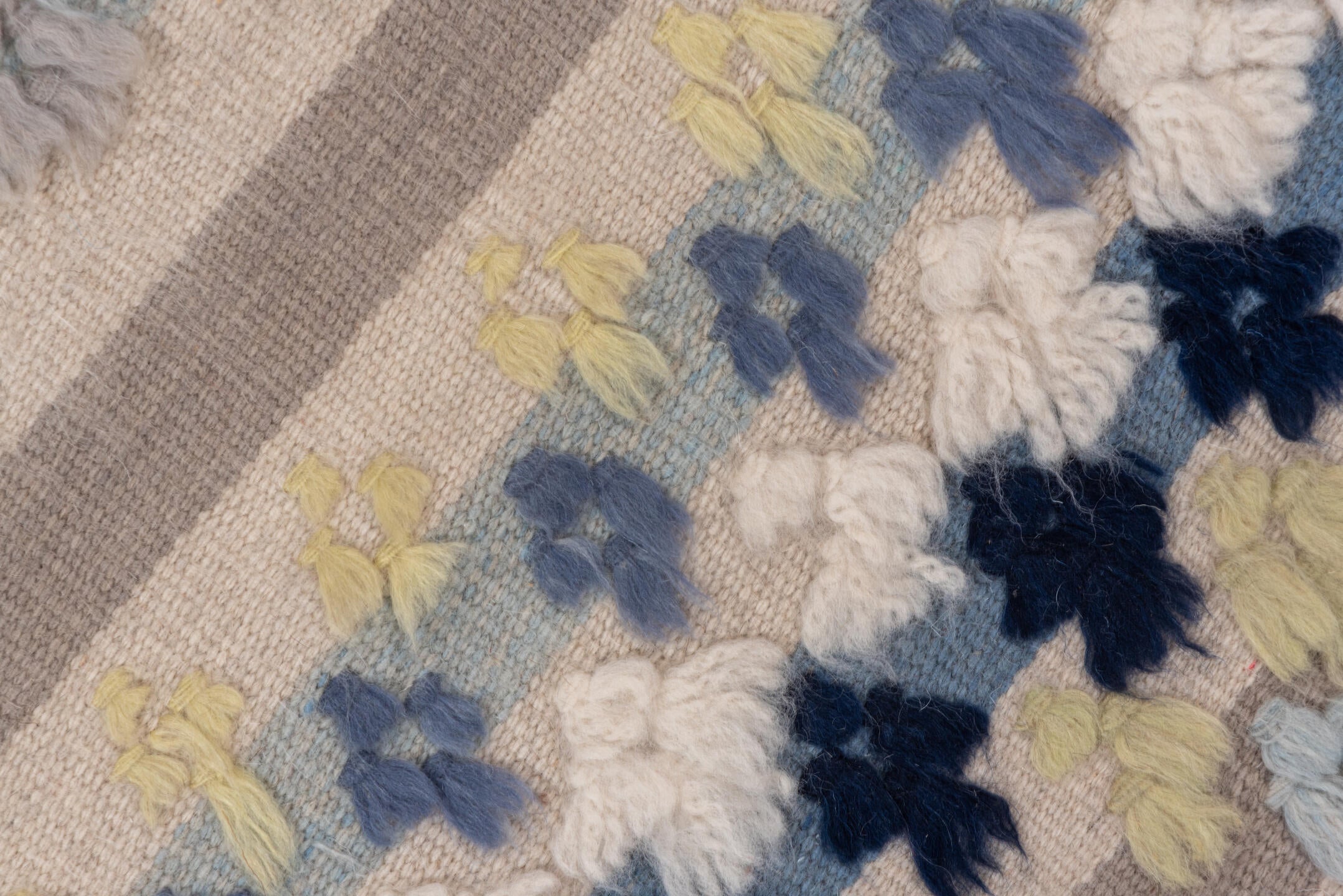 3' x 6' one-of-a-kind handmade vintage Tulu small size rug. Color palette: ivory, pale blue, taupe, navy, butter yellow
