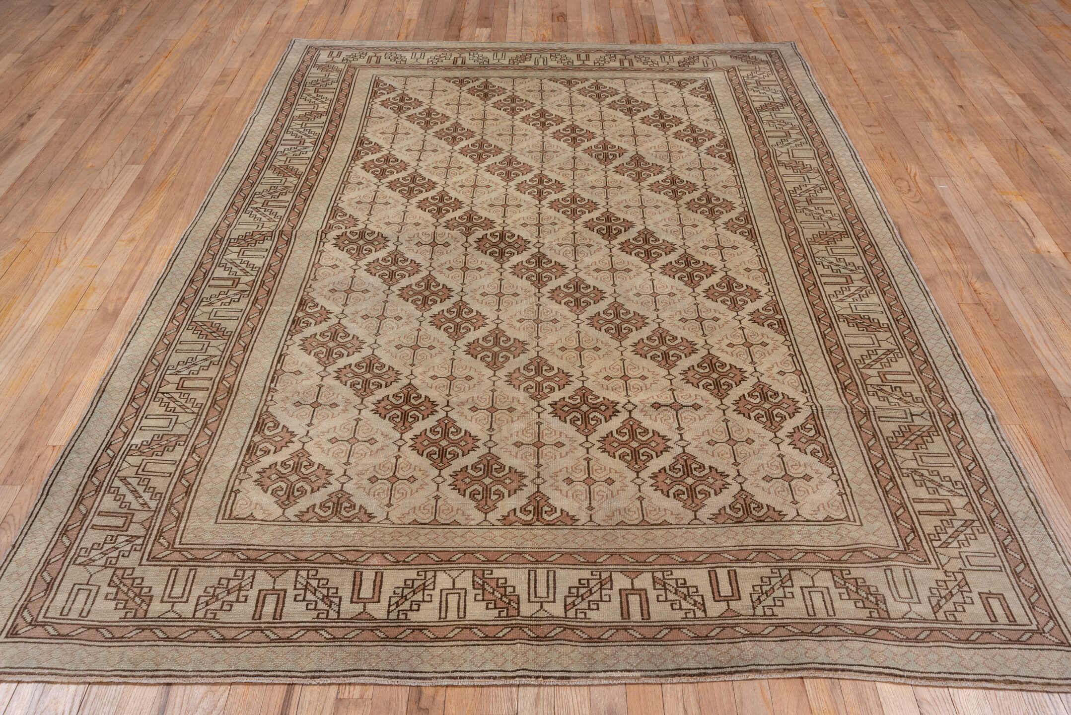 6' x 9' one-of-a-kind handmade antique Oushak medium size rug. Color palette: ivory, taupe, terra cotta, beige, camel, brown