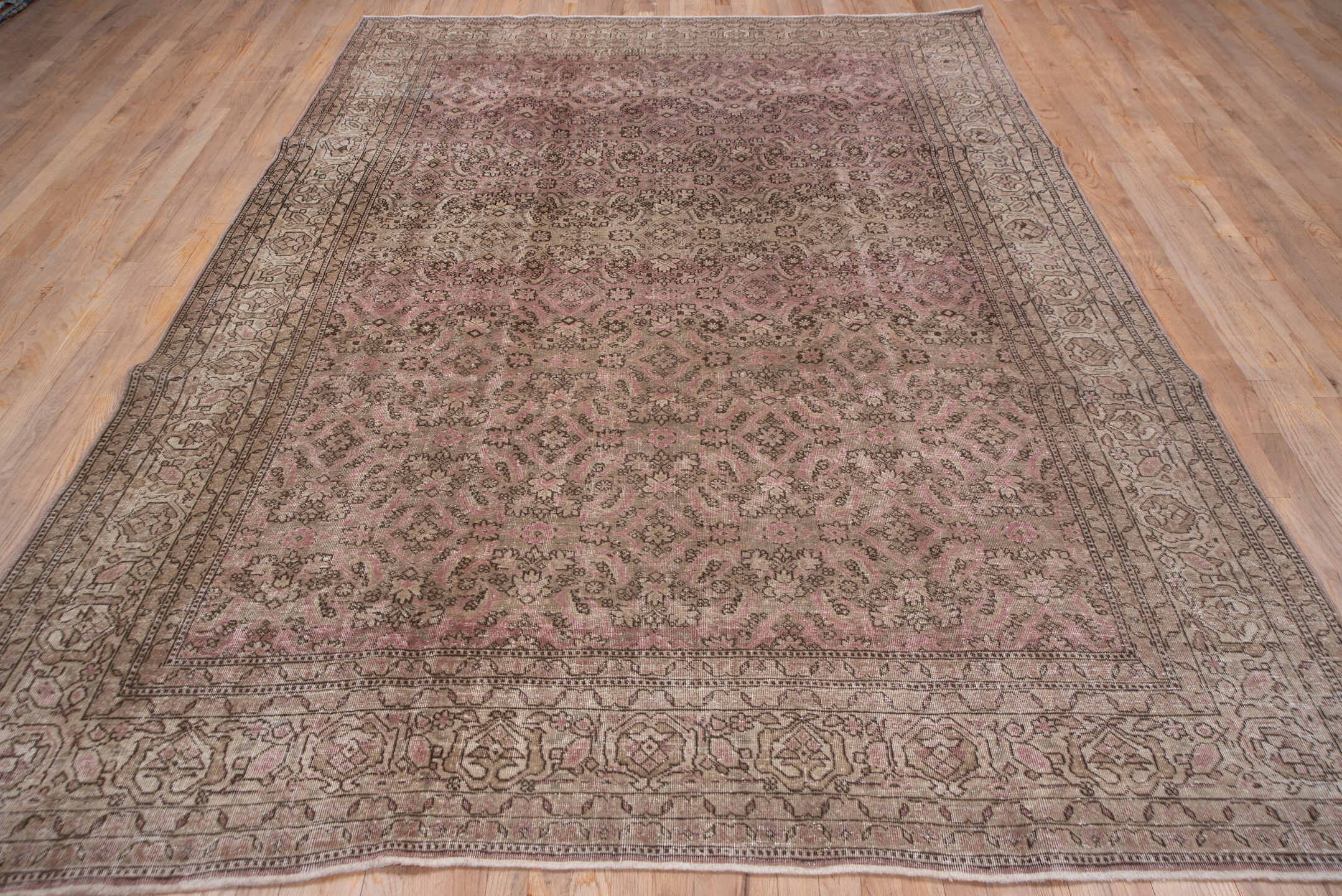 7' x 10' one-of-a-kind handmade vintage Sivas large size rug. Color palette: rose, taupe, dusty pink, brown, ivory, mauve