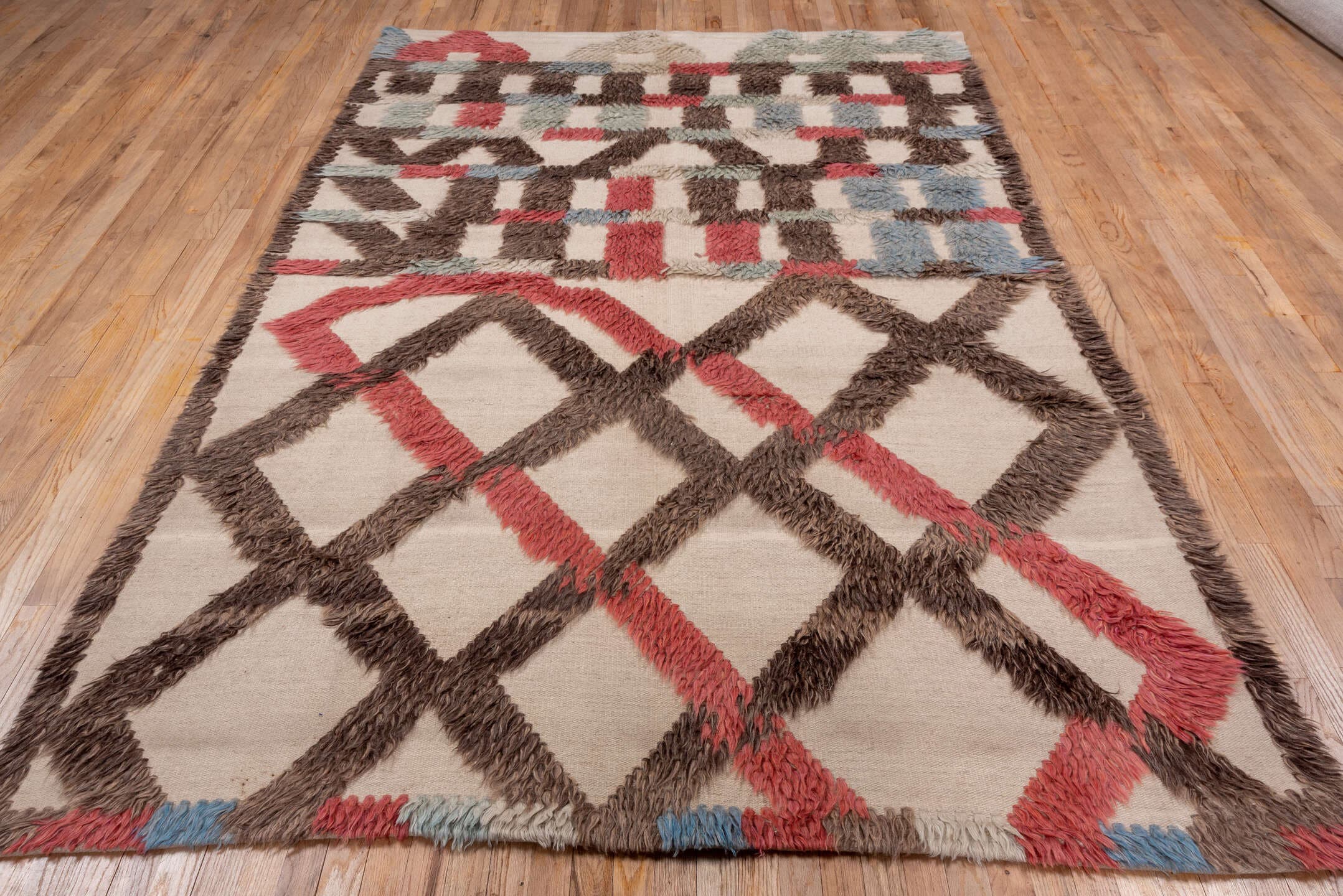 6' x 9' one-of-a-kind handmade vintage Tulu medium size rug. Color palette: ivory, brown, coral, pale blue, sage, taupe
