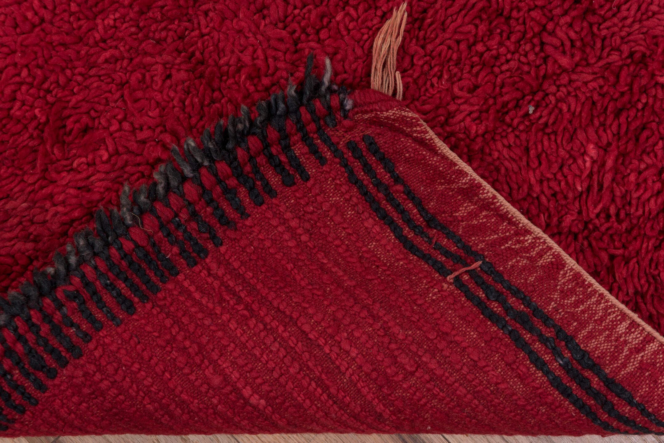 3' x 10' one-of-a-kind handmade vintage Moroccan runner rug. Color palette: crimson, charcoal, burgundy, red, gray, black