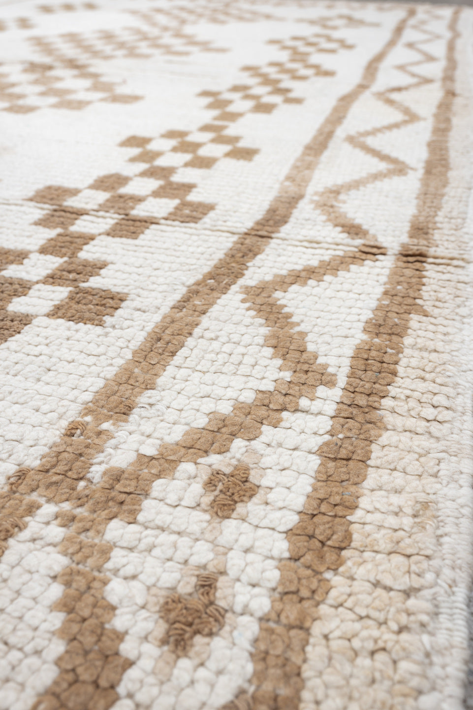 4' x 8' one-of-a-kind handmade vintage Moroccan medium size rug. Color palette: ivory, camel, cream, tan, beige