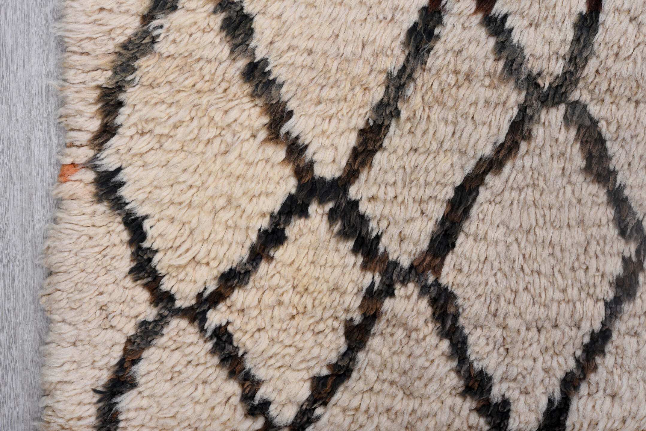 6' x 9' one-of-a-kind handmade vintage Moroccan medium size rug. Color palette: ivory, charcoal, rust, taupe, gray, black