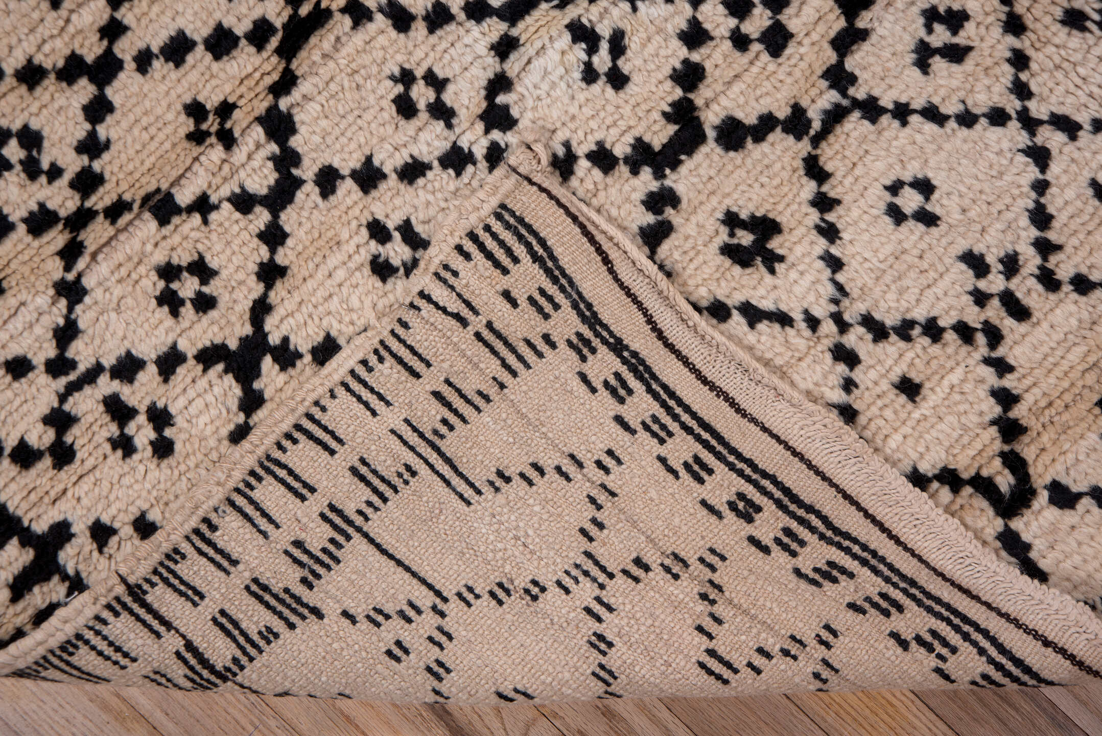 5' x 7' one-of-a-kind handmade vintage Moroccan rug. Color palette: black, brown, goldenrod, gray, light gray, off-white