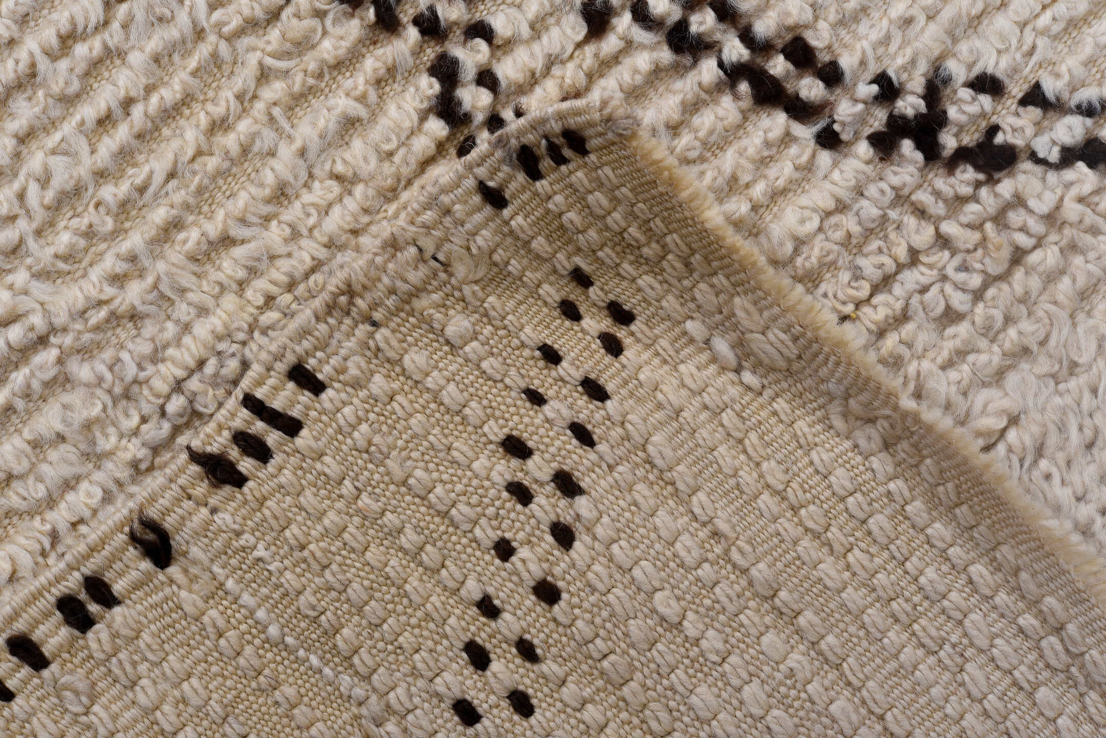 5' x 9' one-of-a-kind handmade antique Moroccan medium size rug. Color palette: ivory, brown, cream