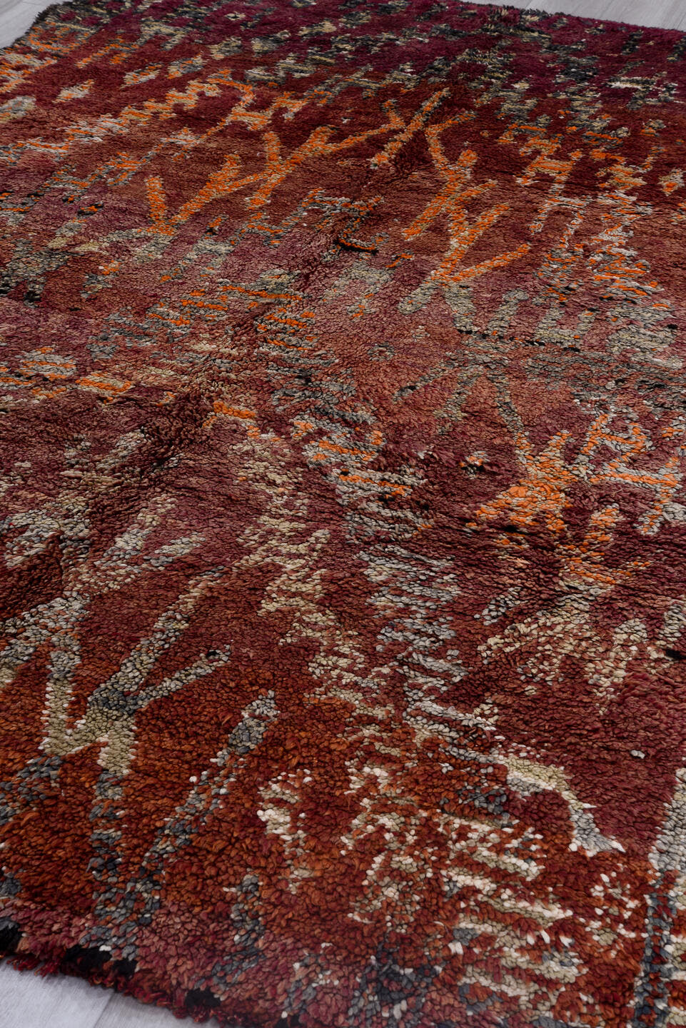 6' x 9' one-of-a-kind handmade vintage Moroccan medium size rug. Color palette: rose, burgundy, charcoal, ivory, rust