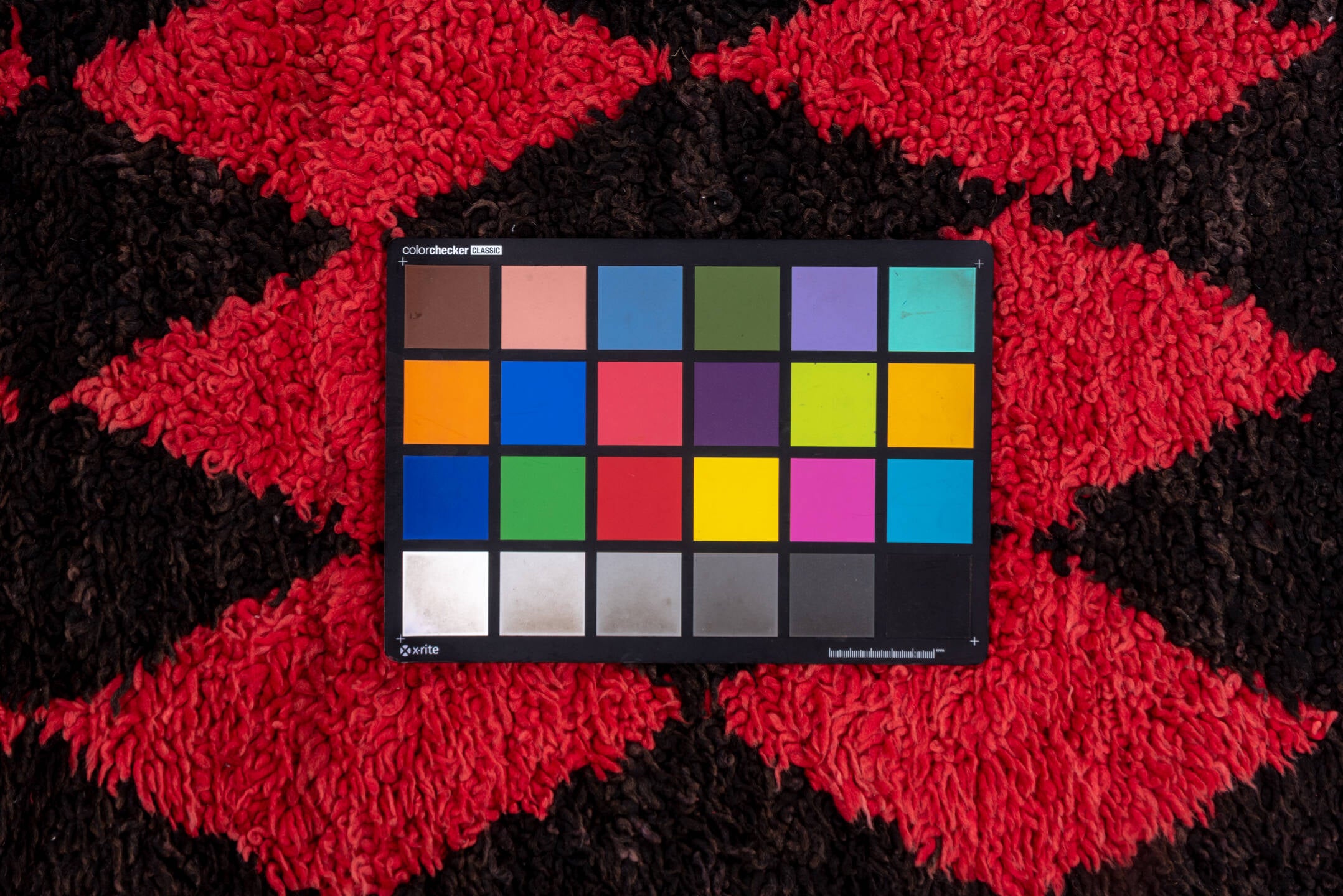 3' x 11' one-of-a-kind handmade vintage Moroccan runner rug. Color palette: brown, indian red, pink, red, redwood