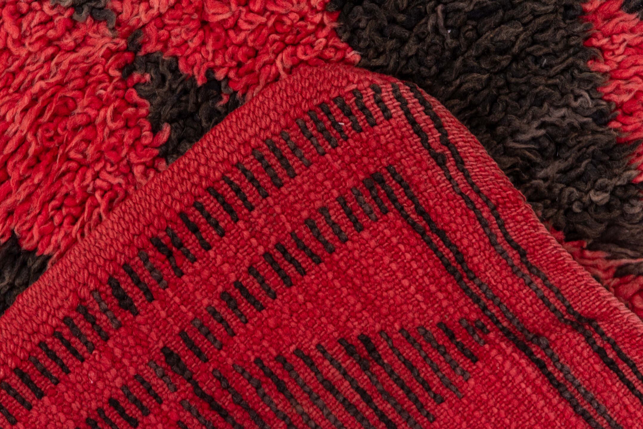 3' x 11' one-of-a-kind handmade vintage Moroccan runner rug. Color palette: crimson, charcoal, rose, red, gray, black, pink
