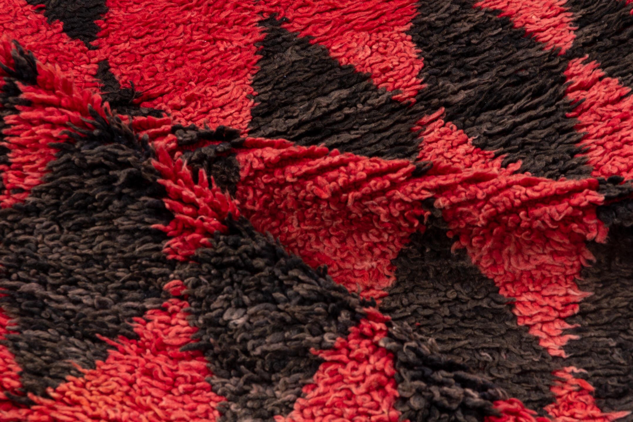3' x 11' one-of-a-kind handmade vintage Moroccan runner rug. Color palette: crimson, charcoal, rose, red, gray, black, pink