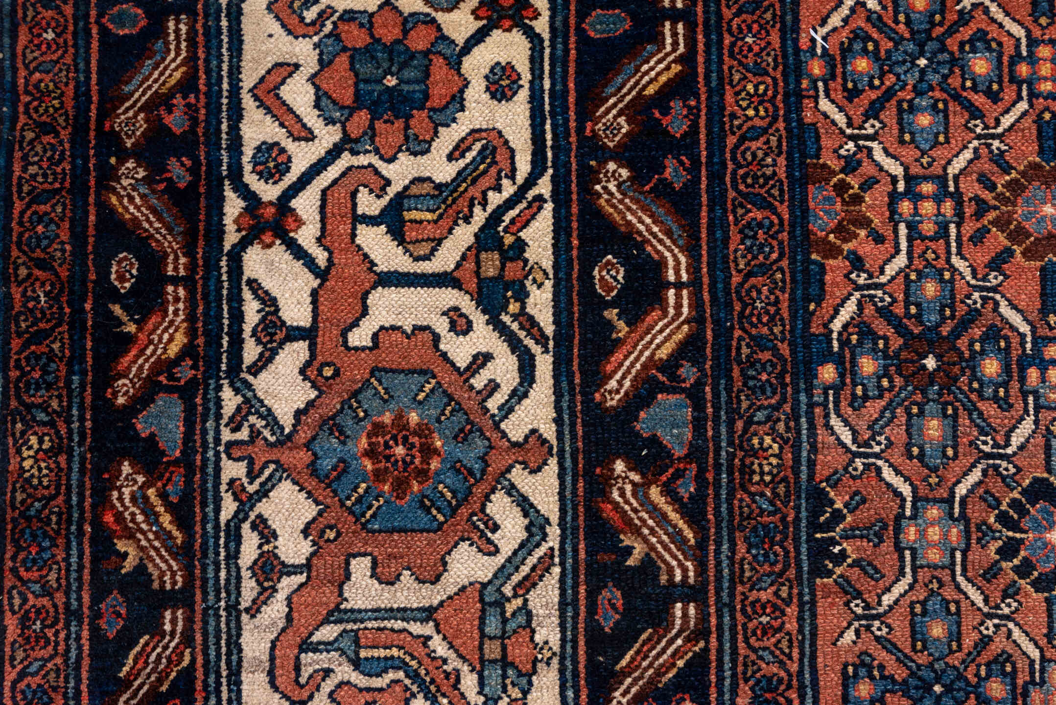 12' x 21' one-of-a-kind handmade antique Bibikabad oversize rug. Color palette: rust, navy, ivory, camel, terra cotta, slate