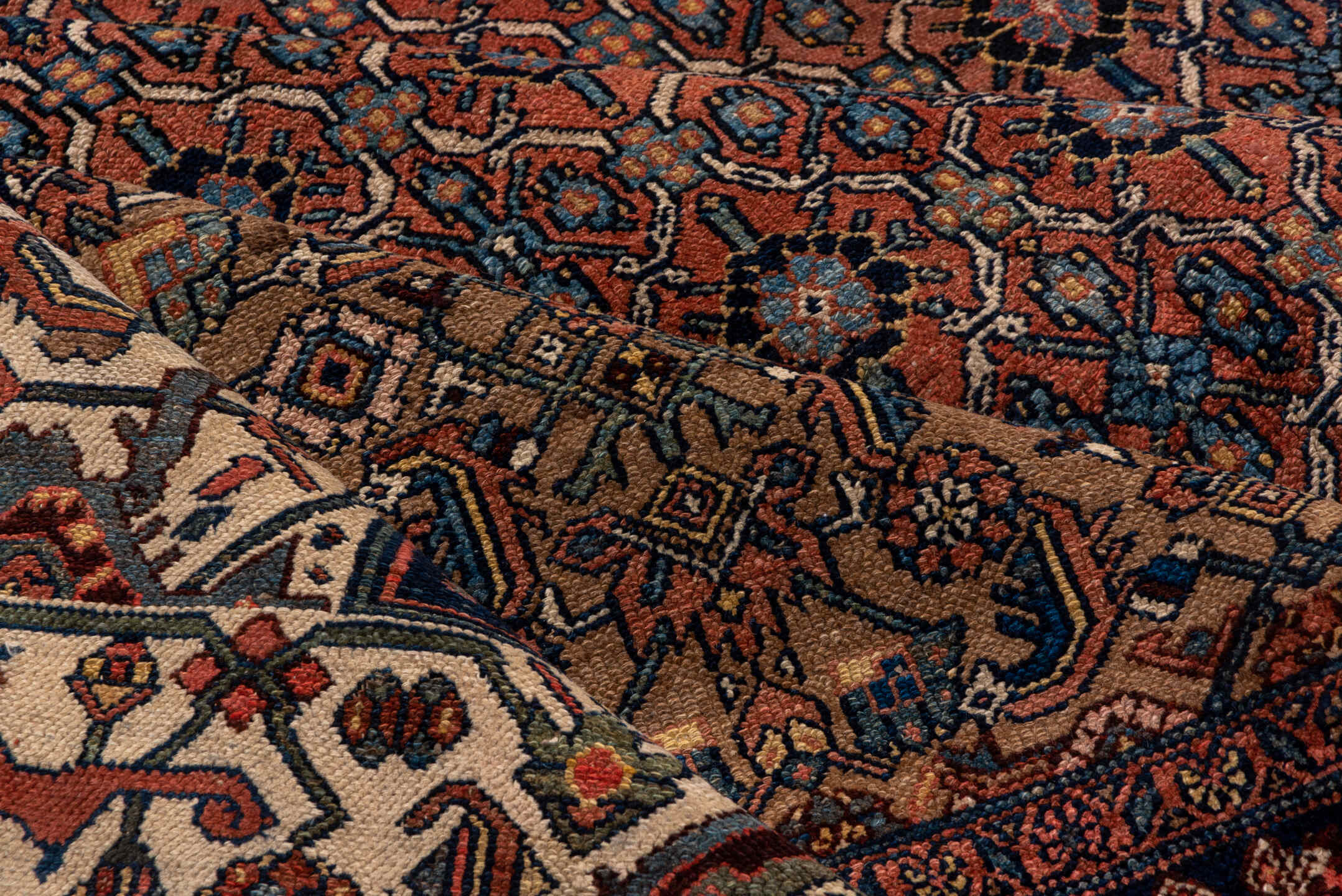 12' x 21' one-of-a-kind handmade antique Bibikabad oversize rug. Color palette: rust, navy, ivory, camel, terra cotta, slate
