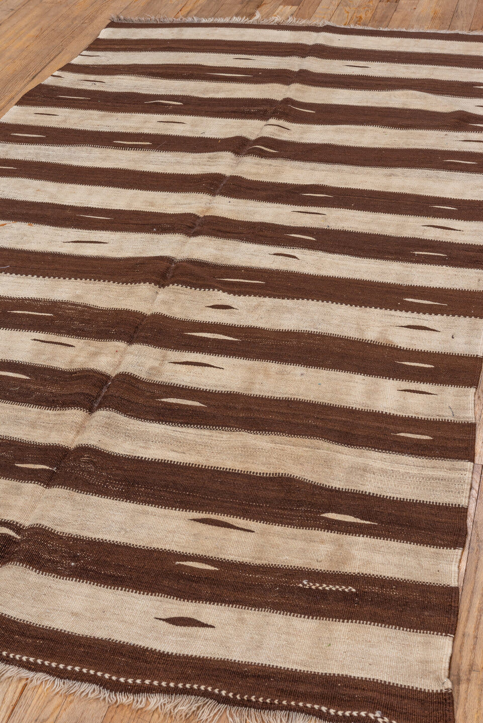 4' x 7' one-of-a-kind handmade vintage Blanket rug. Color palette: ivory, brown, taupe, beige, gray