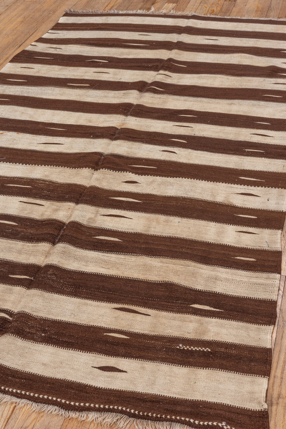 4' x 7' one-of-a-kind handmade vintage Blanket rug. Color palette: brown, gray, light gray, off-white, pink, redwood