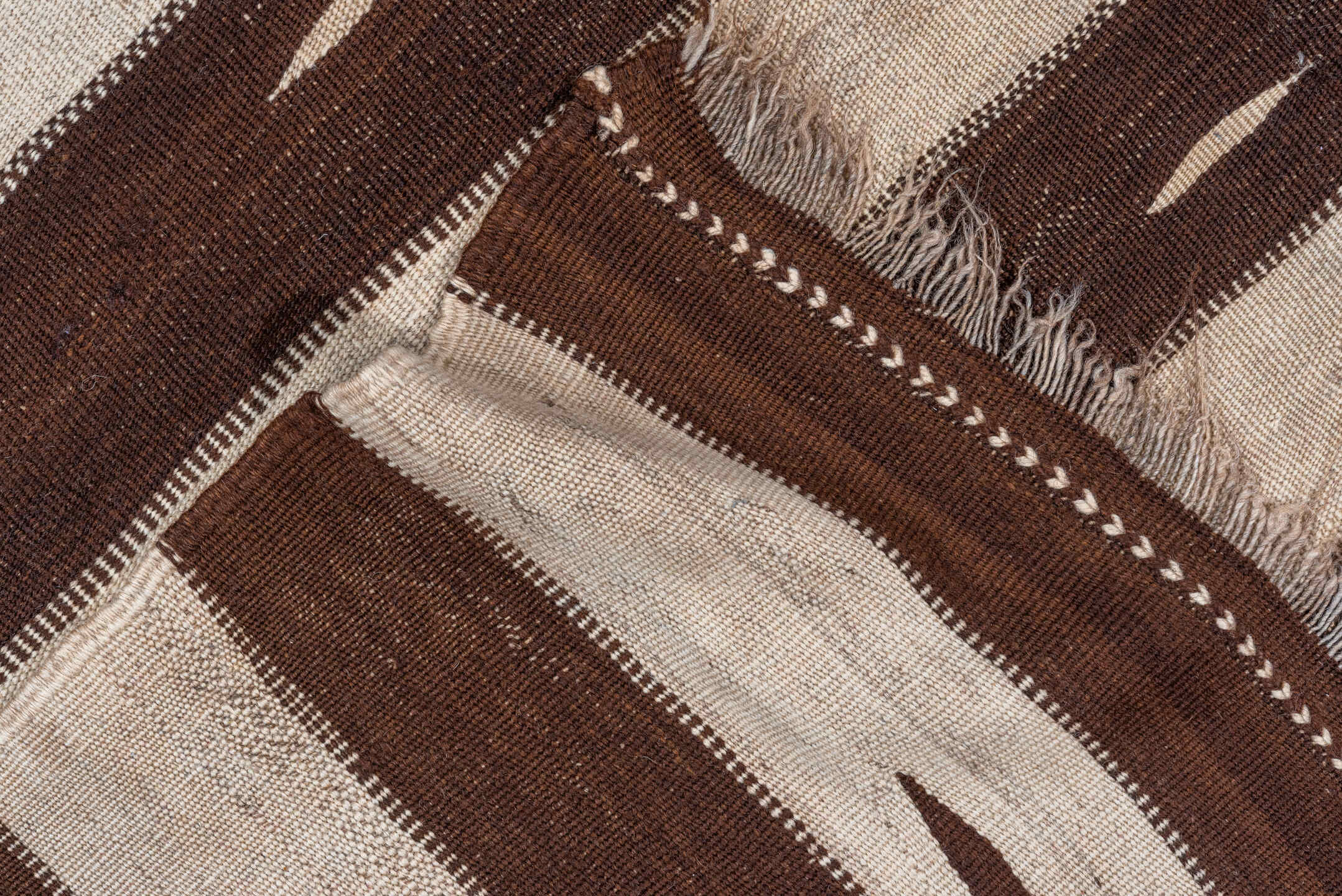 4' x 7' one-of-a-kind handmade vintage Blanket rug. Color palette: brown, gray, light gray, off-white, pink, redwood