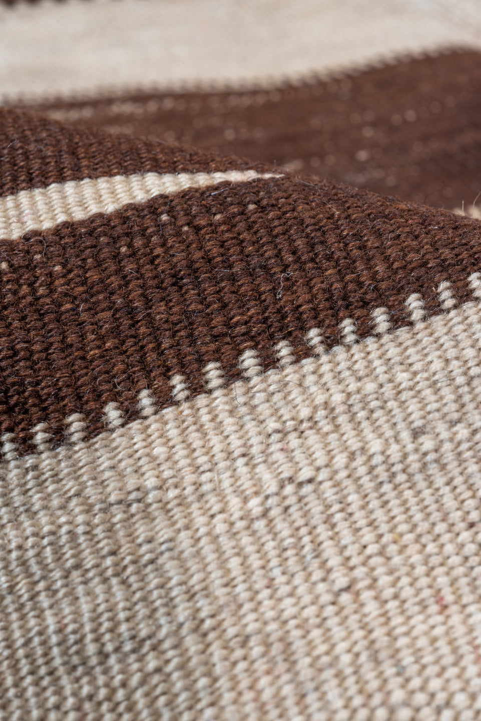 4' x 7' one-of-a-kind handmade vintage Blanket rug. Color palette: brown, gray, light gray, off-white, pink, redwood