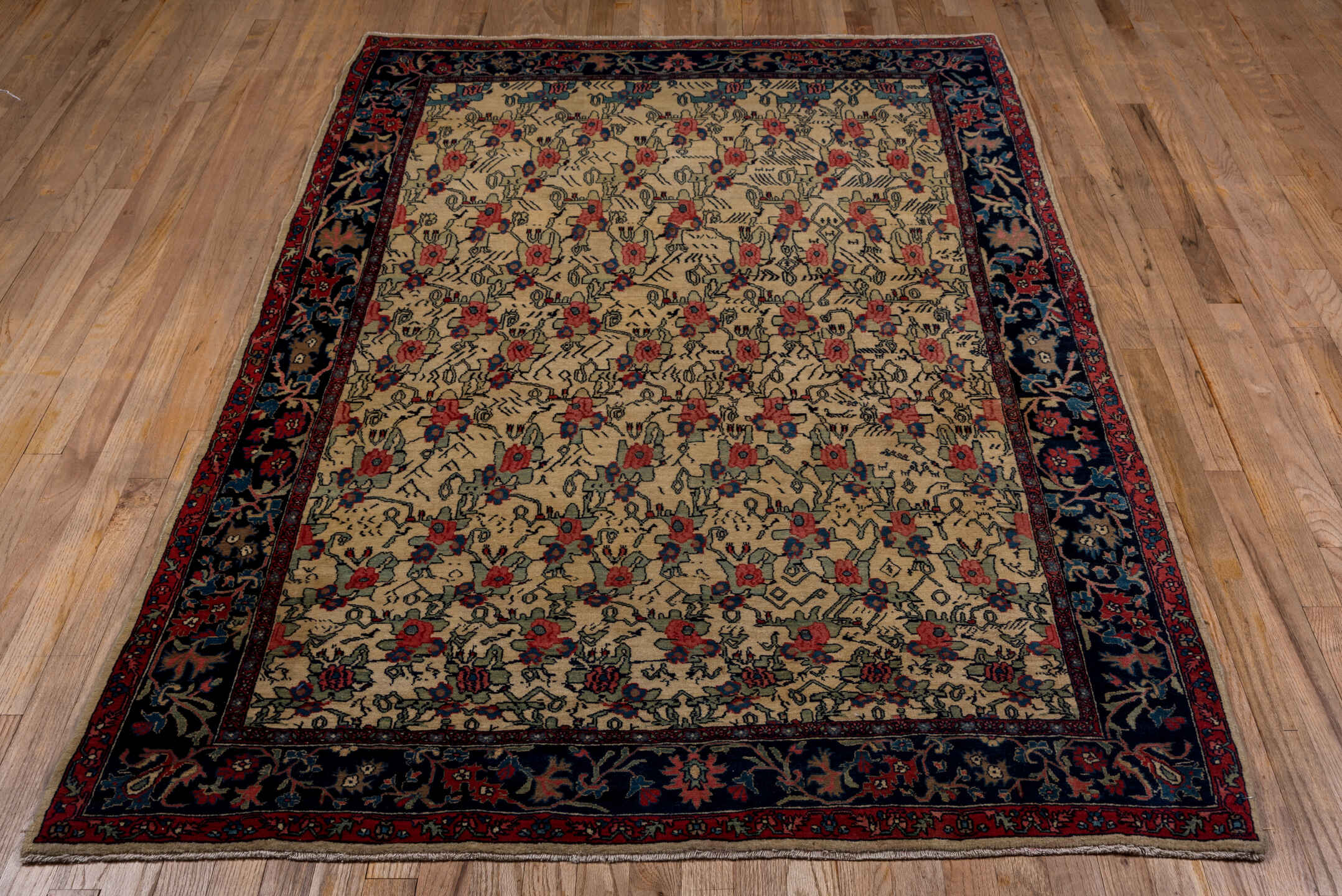 4' x 7' one-of-a-kind handmade vintage Bidjar rug. Color palette: arapawa, black, blue, brown, gray, off-white, pink, red