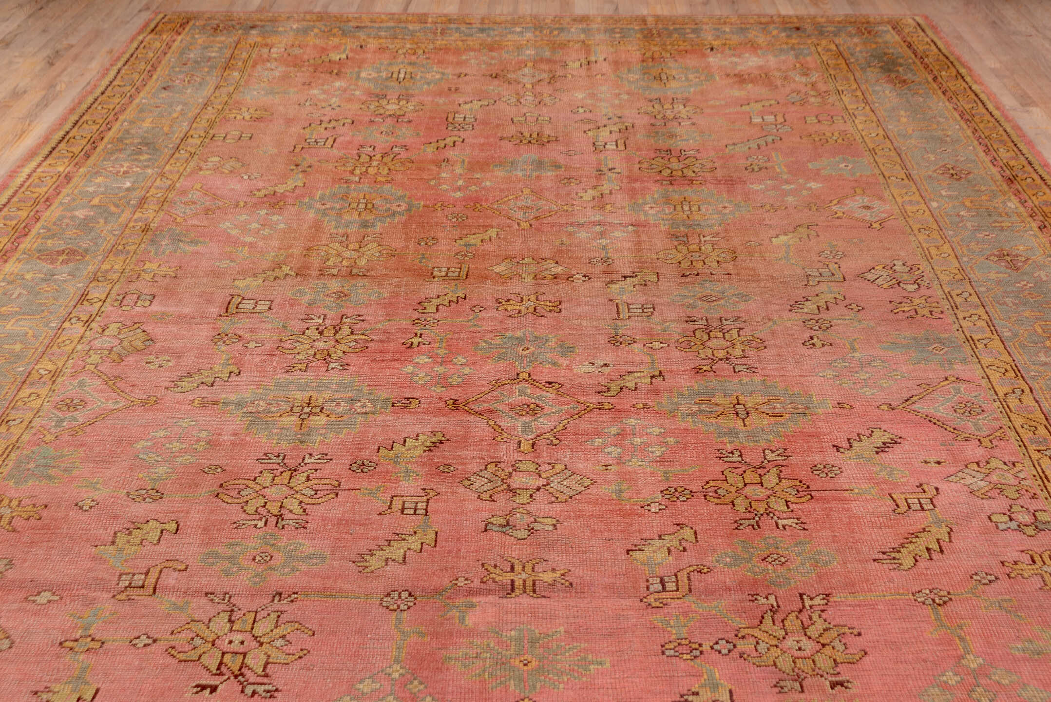 10' x 16' one-of-a-kind handmade antique Oushak rug. Color palette: rose, blue_gray, gold, sage, ivory, terra_cotta, taupe