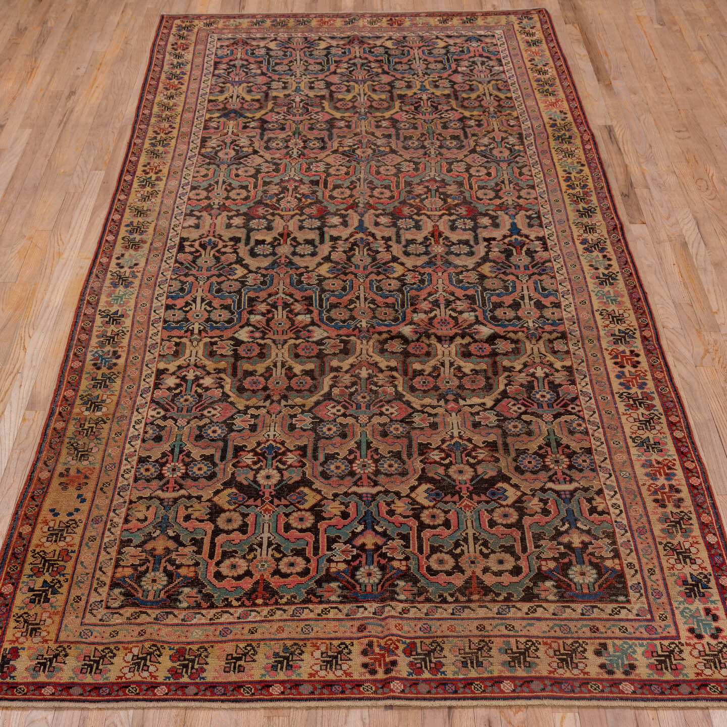 6' x 12' one-of-a-kind handmade vintage Karabagh large size rug. Color palette: black, brown, gray, pink, red
