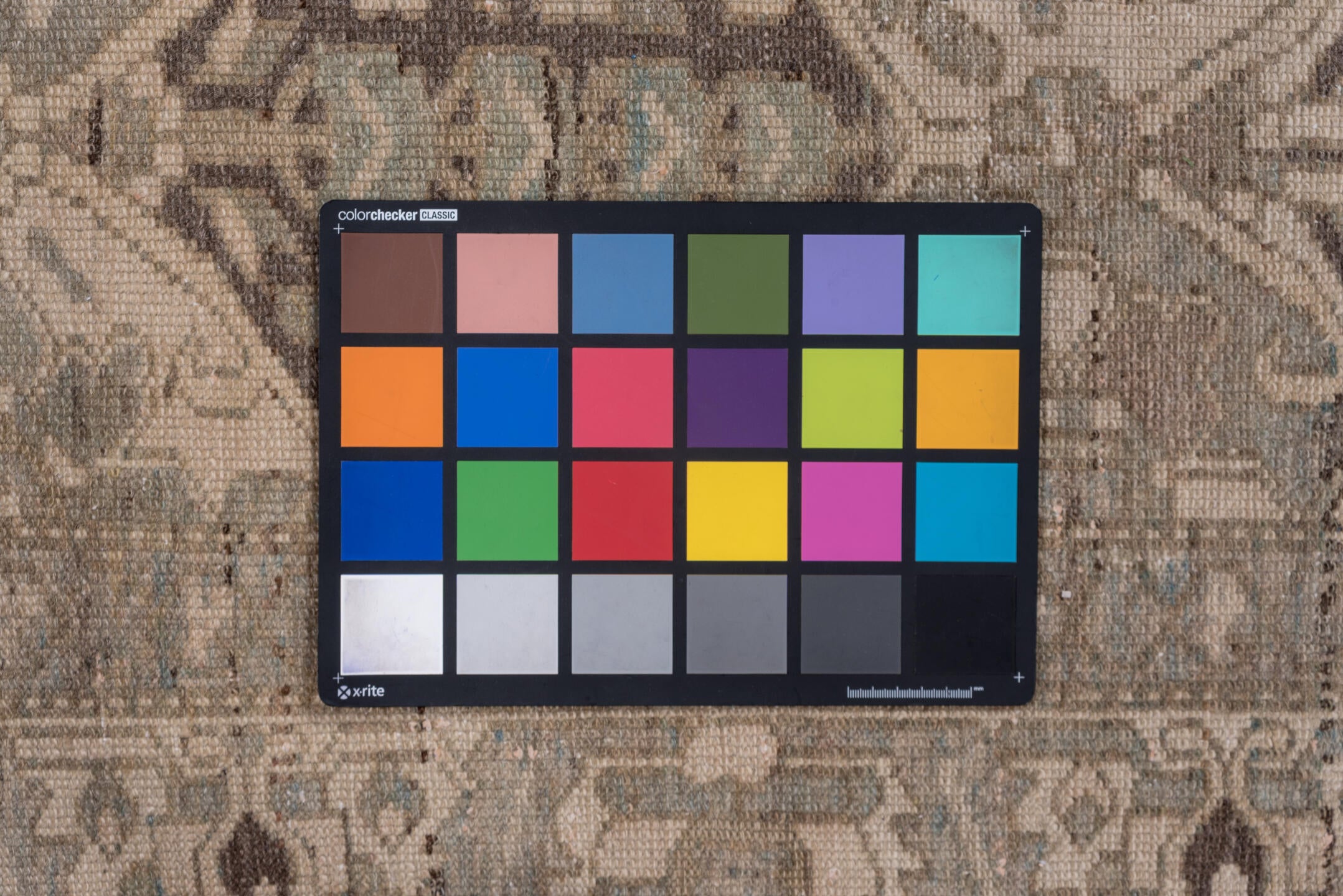 5' x 9' one-of-a-kind handmade vintage Baktiary medium size rug. Color palette: brown, gray, light gray, off-white, pink