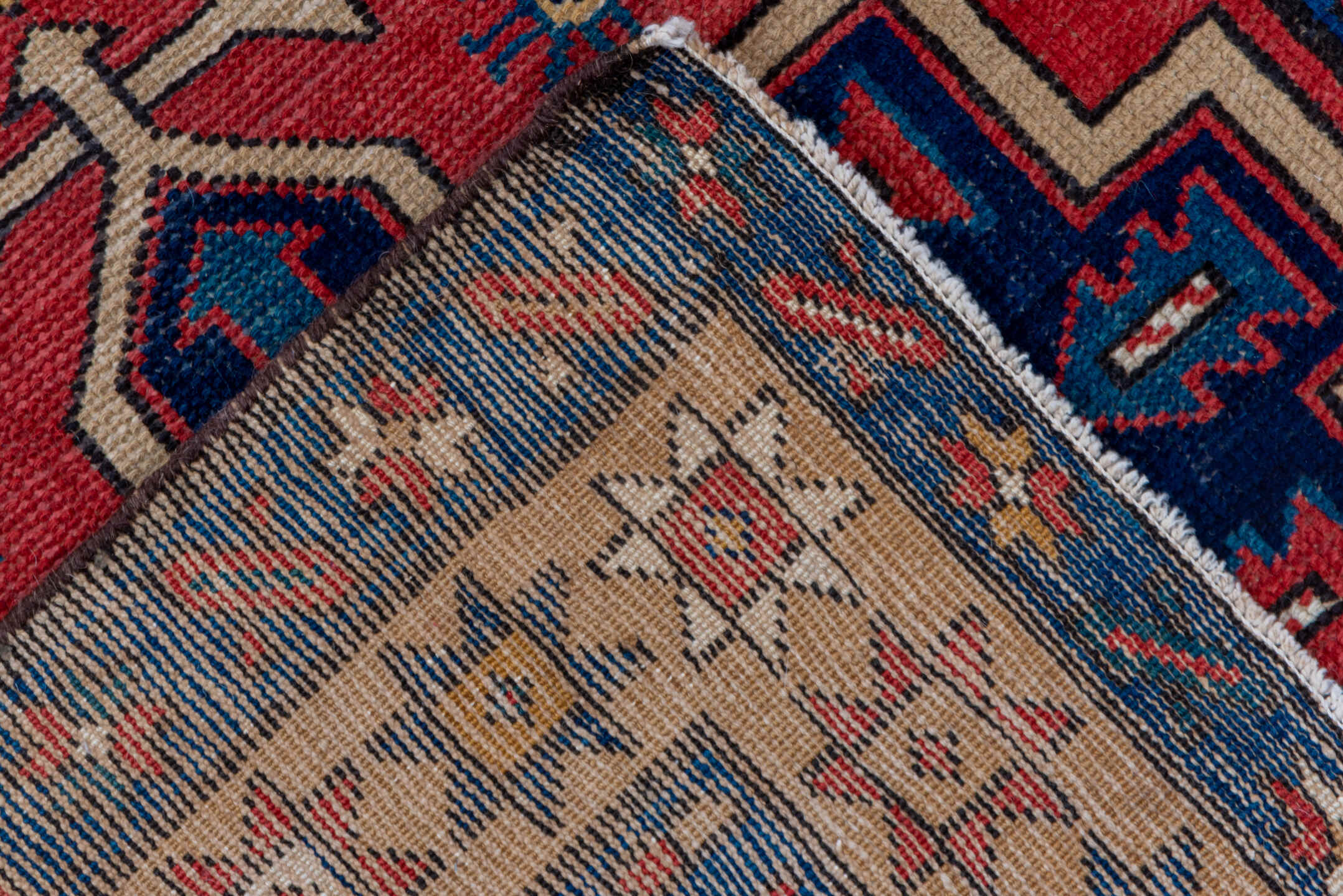 3' x 10' one-of-a-kind handmade antique Heriz runner rug. Color palette: red, navy, ivory, camel, rust, charcoal, blue