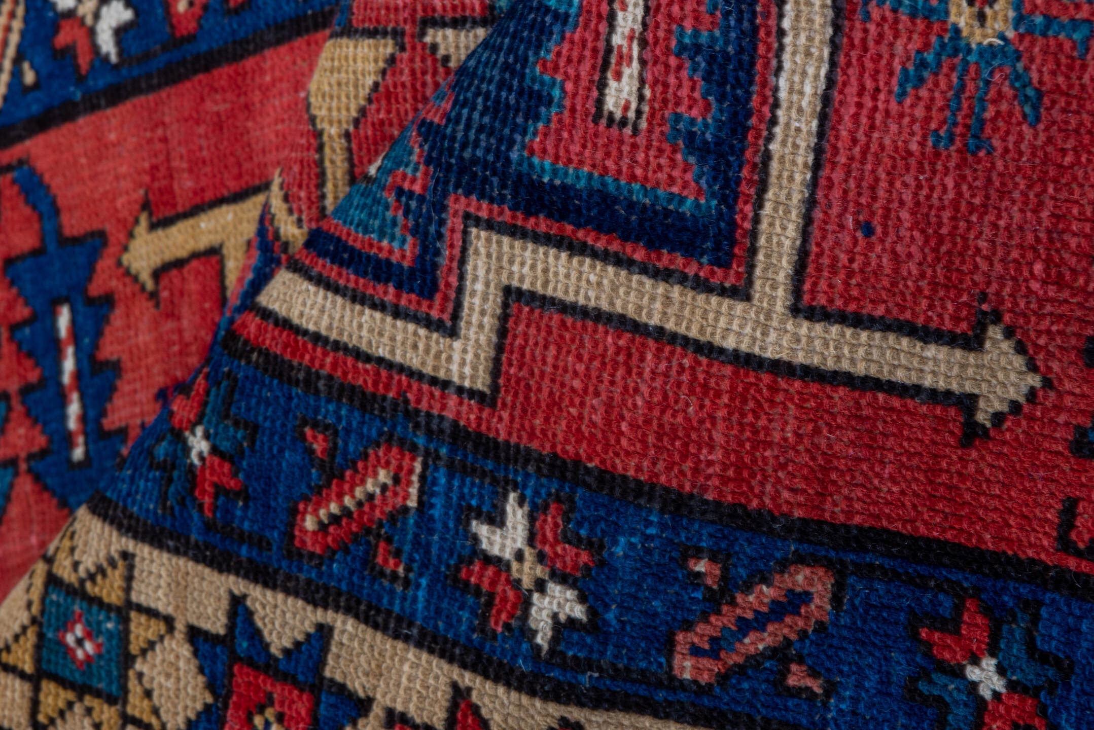 3' x 10' one-of-a-kind handmade antique Heriz runner rug. Color palette: red, navy, ivory, camel, rust, charcoal, blue