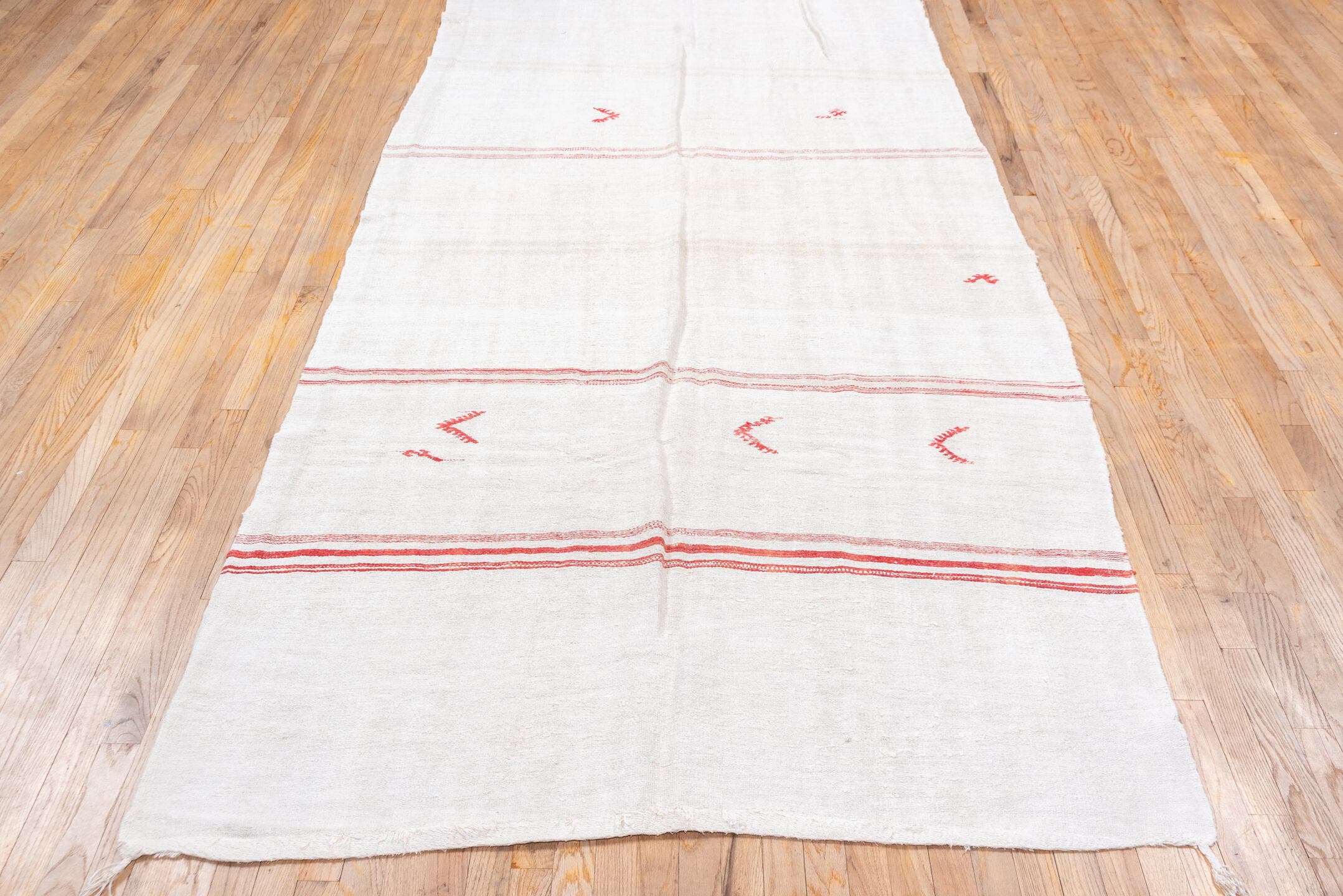 5' x 12' one-of-a-kind handmade vintage Hemp Kilim rug. Color palette: ivory, red, cream