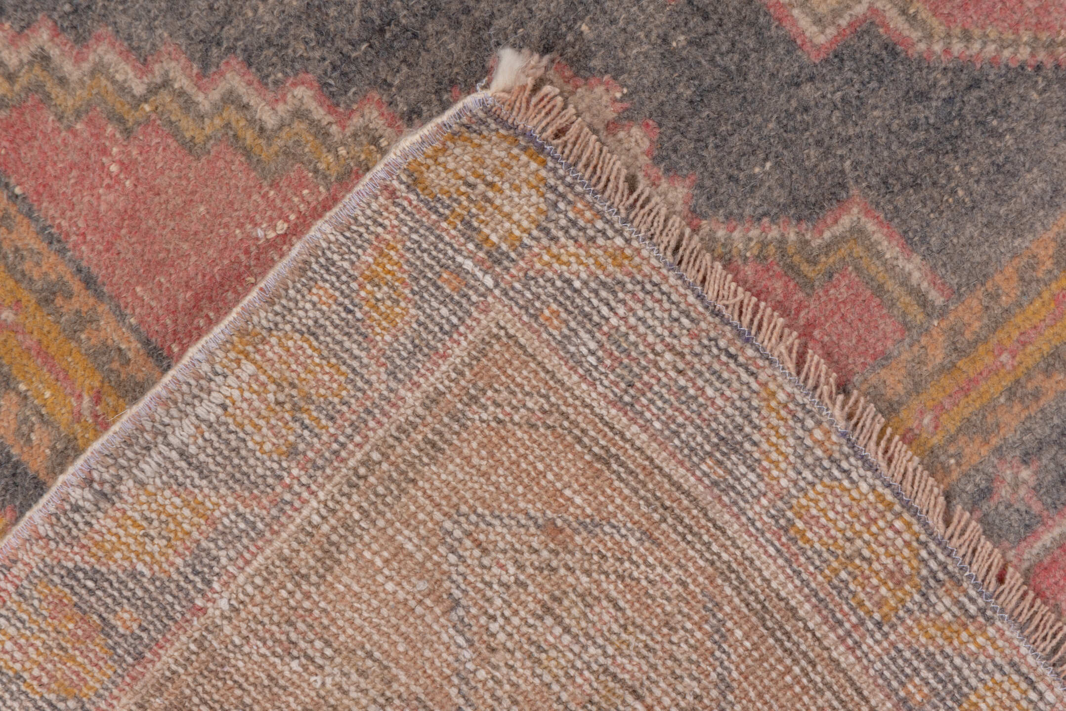 4' x 7' one-of-a-kind handmade vintage Oushak rug. Color palette: brown, gray, light gray, off-white, orange, pink