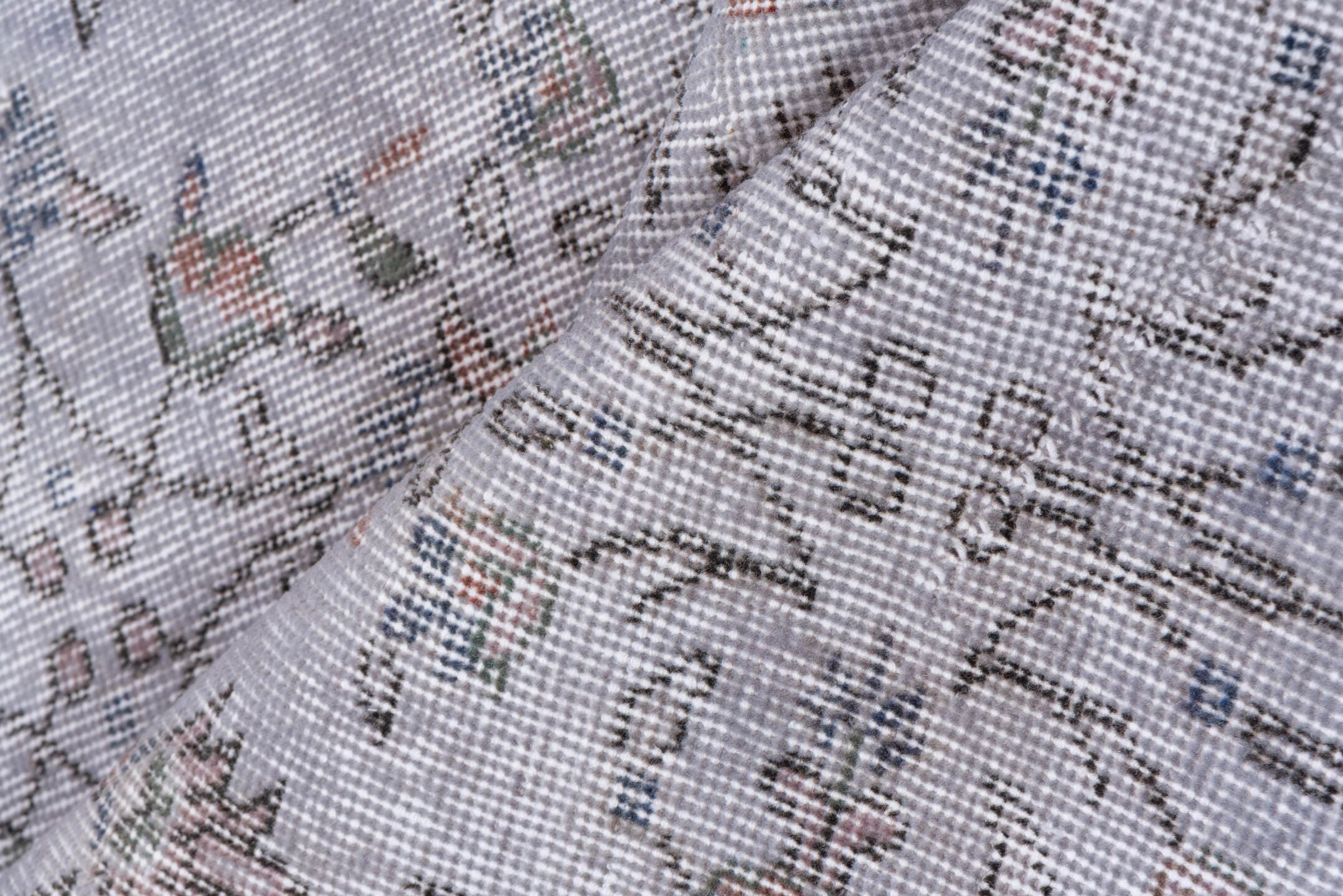 5' x 9' one-of-a-kind handmade antique Sparta medium size rug. Color palette: ivory, taupe, sage, rose, slate, beige, gray