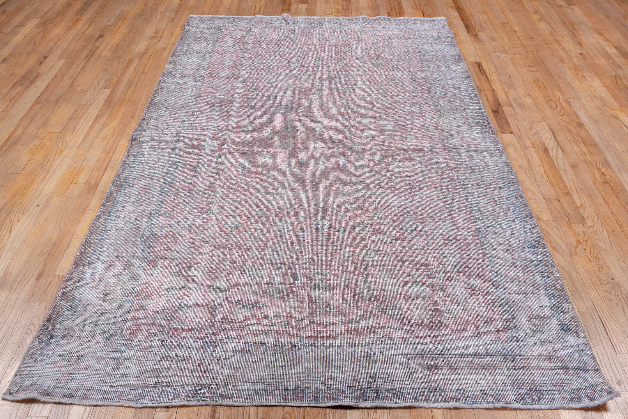 5' x 8' one-of-a-kind handmade antique Overdyed medium size rug. Color palette: blush, ivory, pale gray, dusty rose, taupe