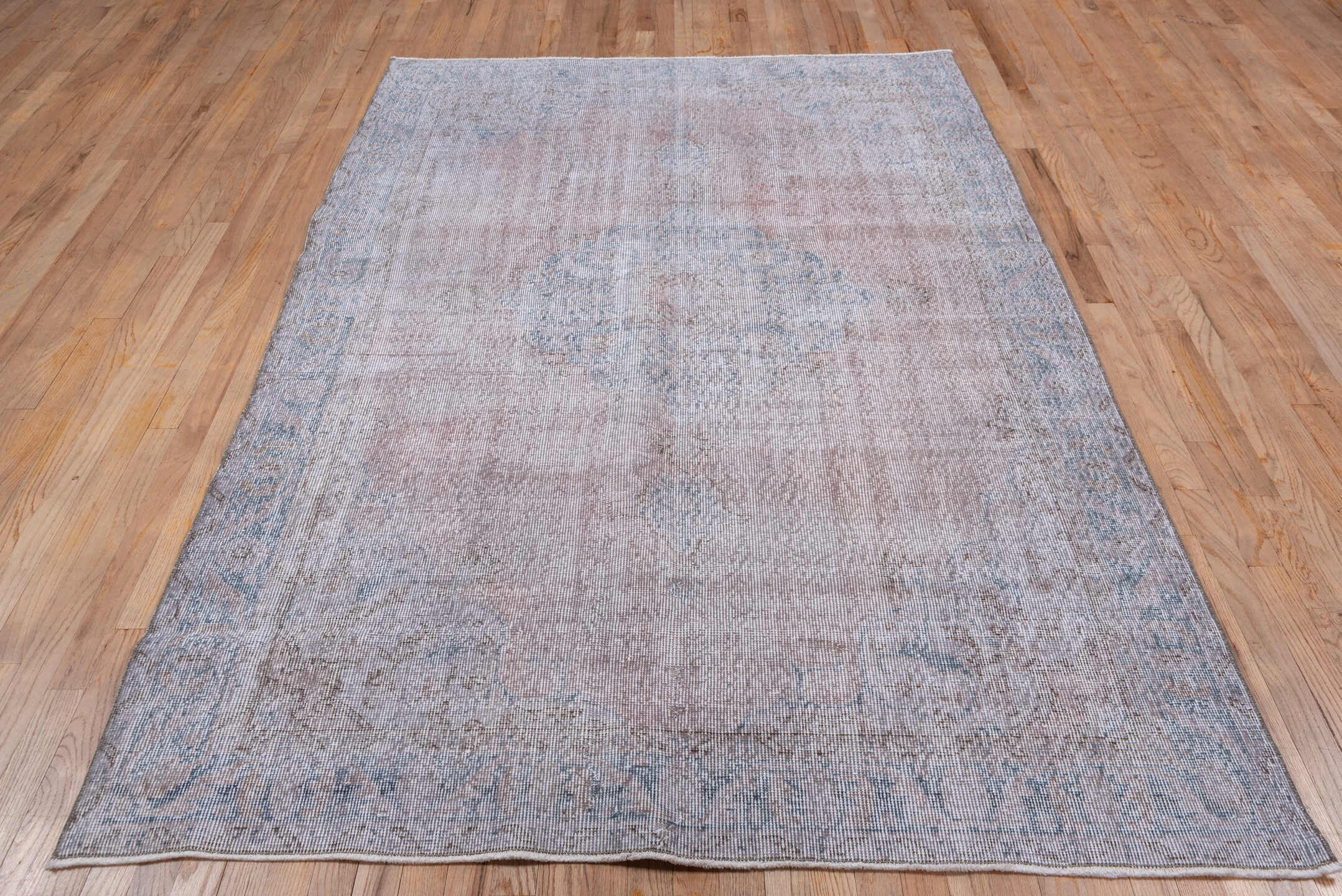 5' x 8' one-of-a-kind handmade antique Sparta medium size rug. Color palette: blush, ivory, pale blue, taupe, cream, pink