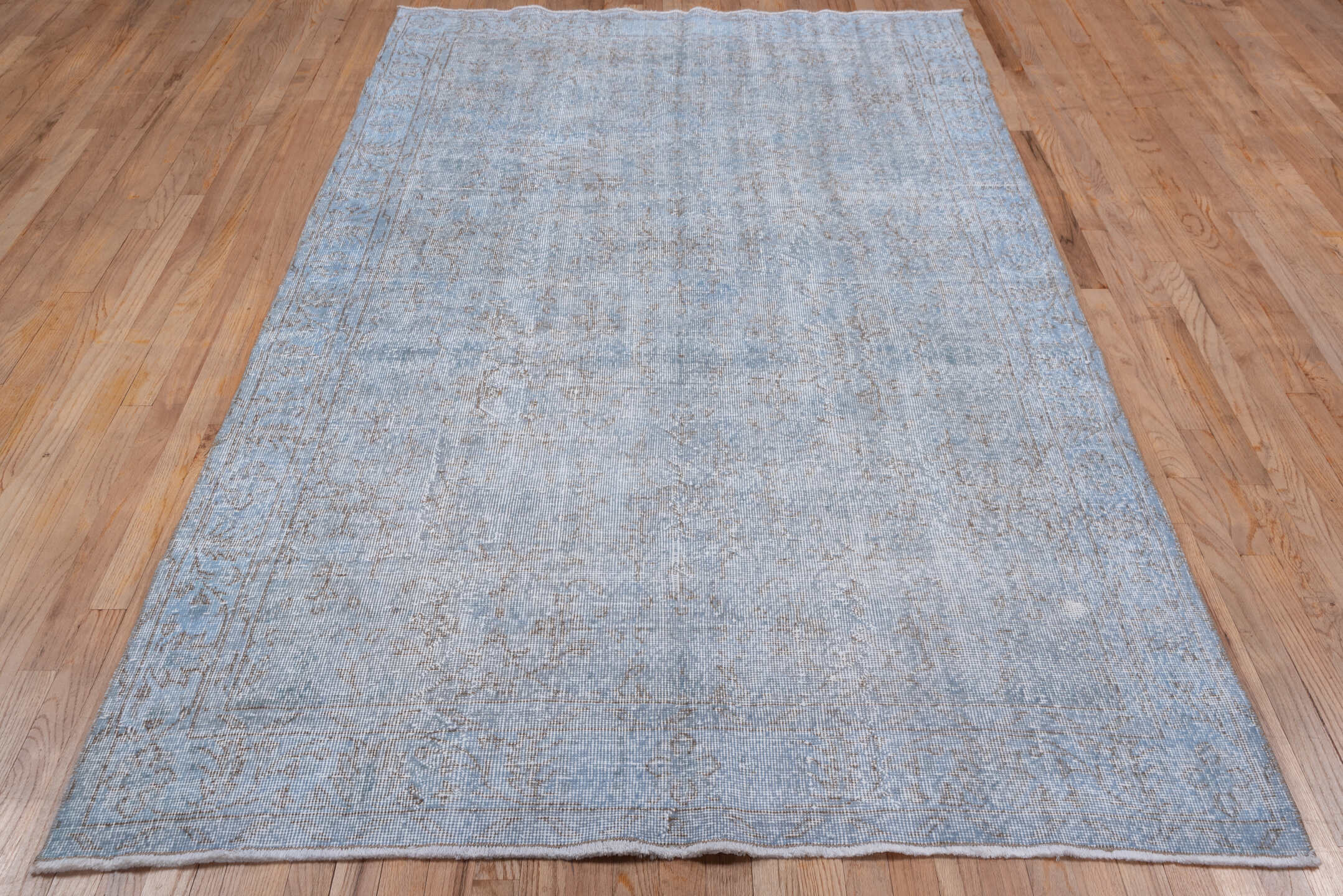 5' x 9' one-of-a-kind handmade antique Overdyed medium size rug. Color palette: pale blue, ivory, taupe, beige, light gray