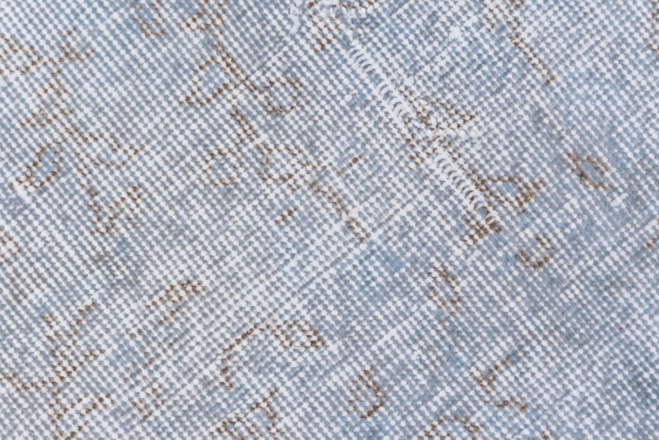 5' x 9' one-of-a-kind handmade antique Overdyed medium size rug. Color palette: pale blue, ivory, taupe, beige, light gray