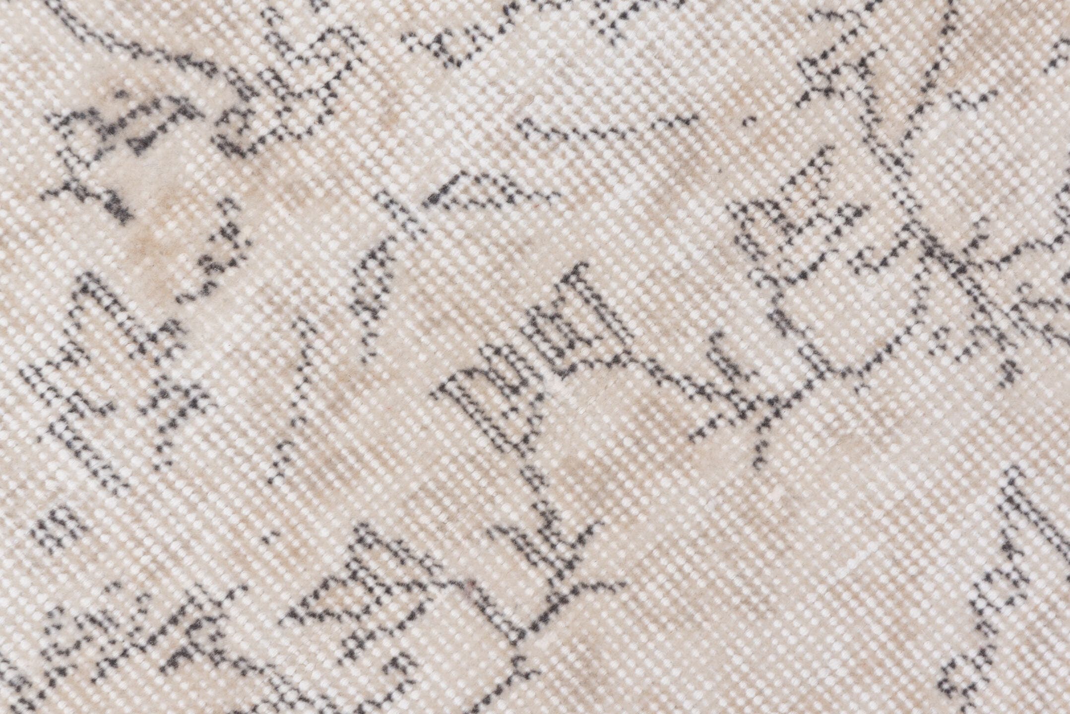 5' x 9' one-of-a-kind handmade antique Sparta medium size rug. Color palette: ivory, taupe, beige, cream, pale gray, gray