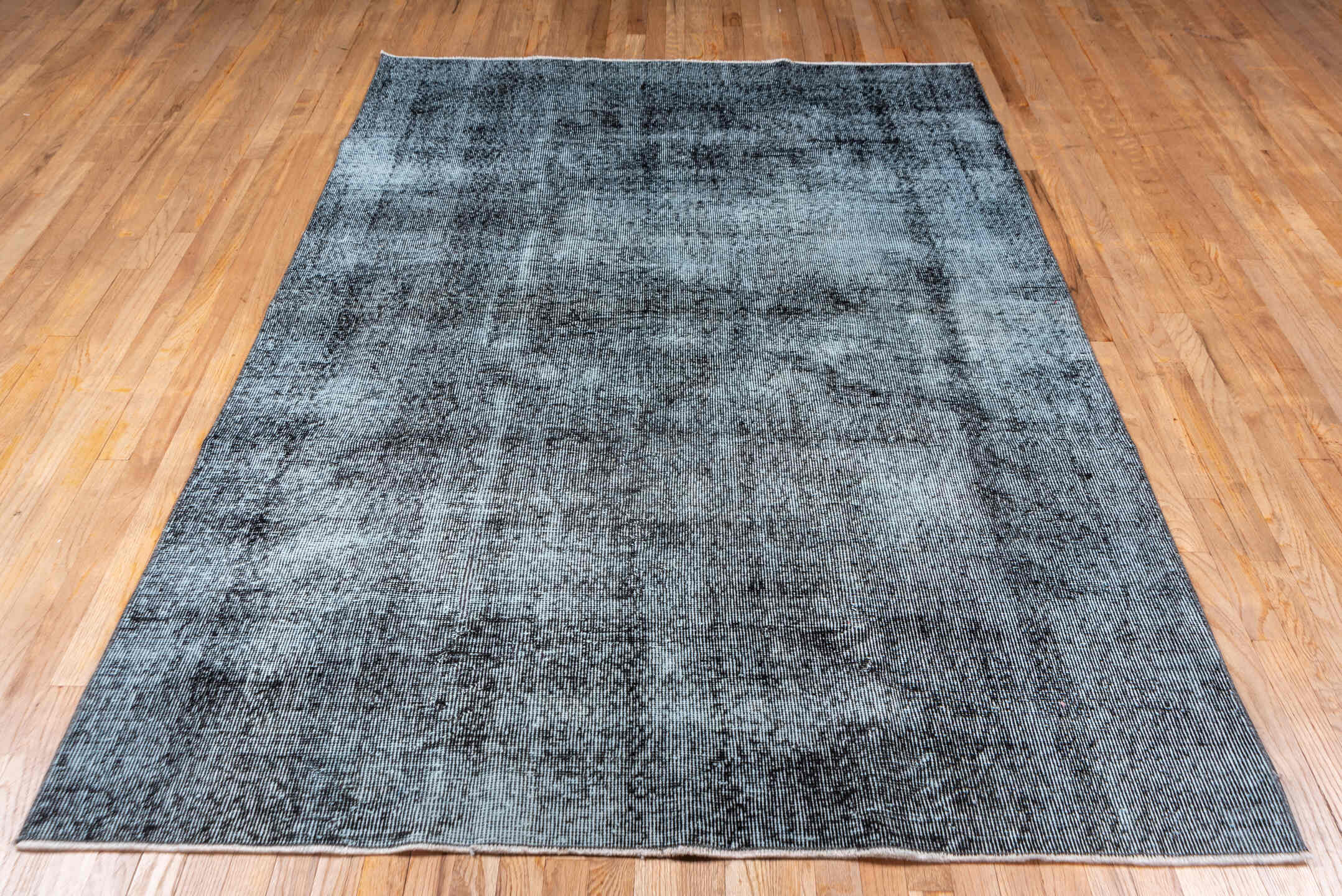 5' x 8' one-of-a-kind handmade vintage Overdyed medium size rug. Color palette: black, blue, charcoal, gainsboro, gray