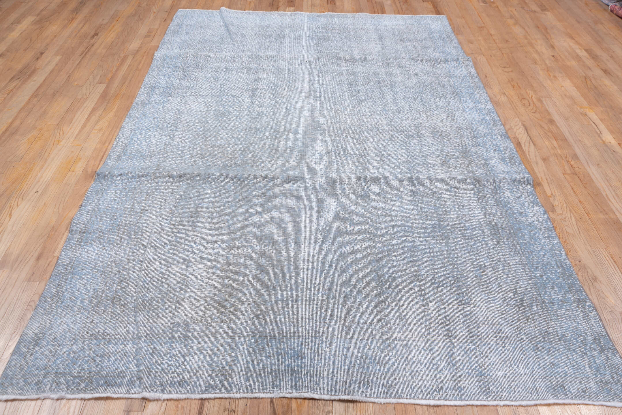 6' x 9' one-of-a-kind handmade antique Overdyed medium size rug. Color palette: ivory, pale blue, silver, taupe, gray
