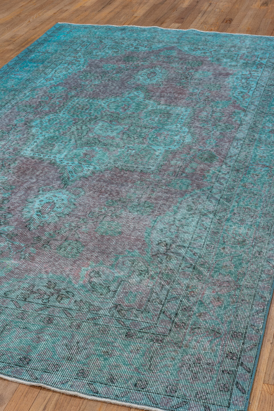 5' x 9' one-of-a-kind handmade antique Overdyed medium size rug. Color palette: turquoise, aqua, lavender, charcoal, teal