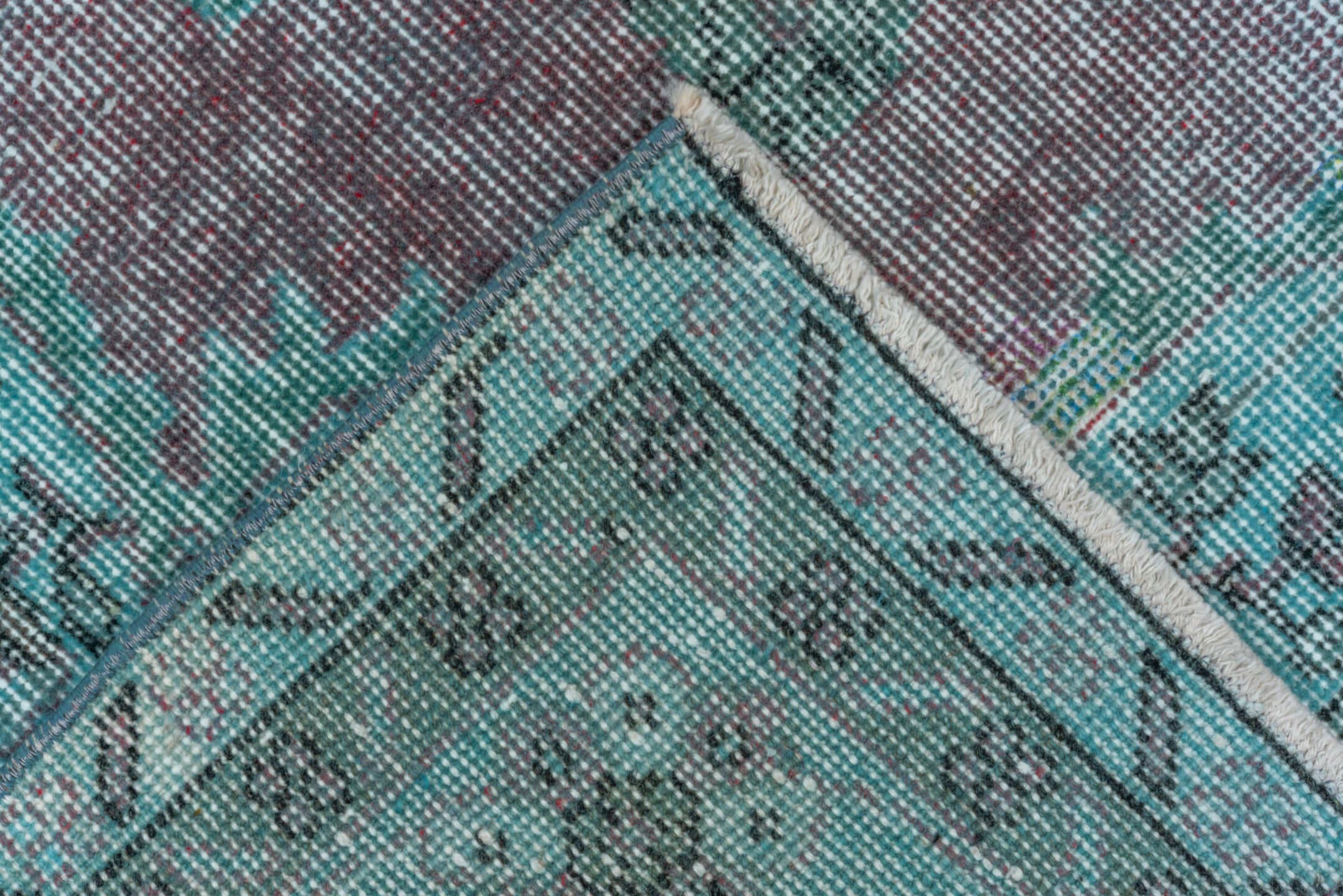 5' x 9' one-of-a-kind handmade antique Overdyed medium size rug. Color palette: turquoise, aqua, lavender, charcoal, teal