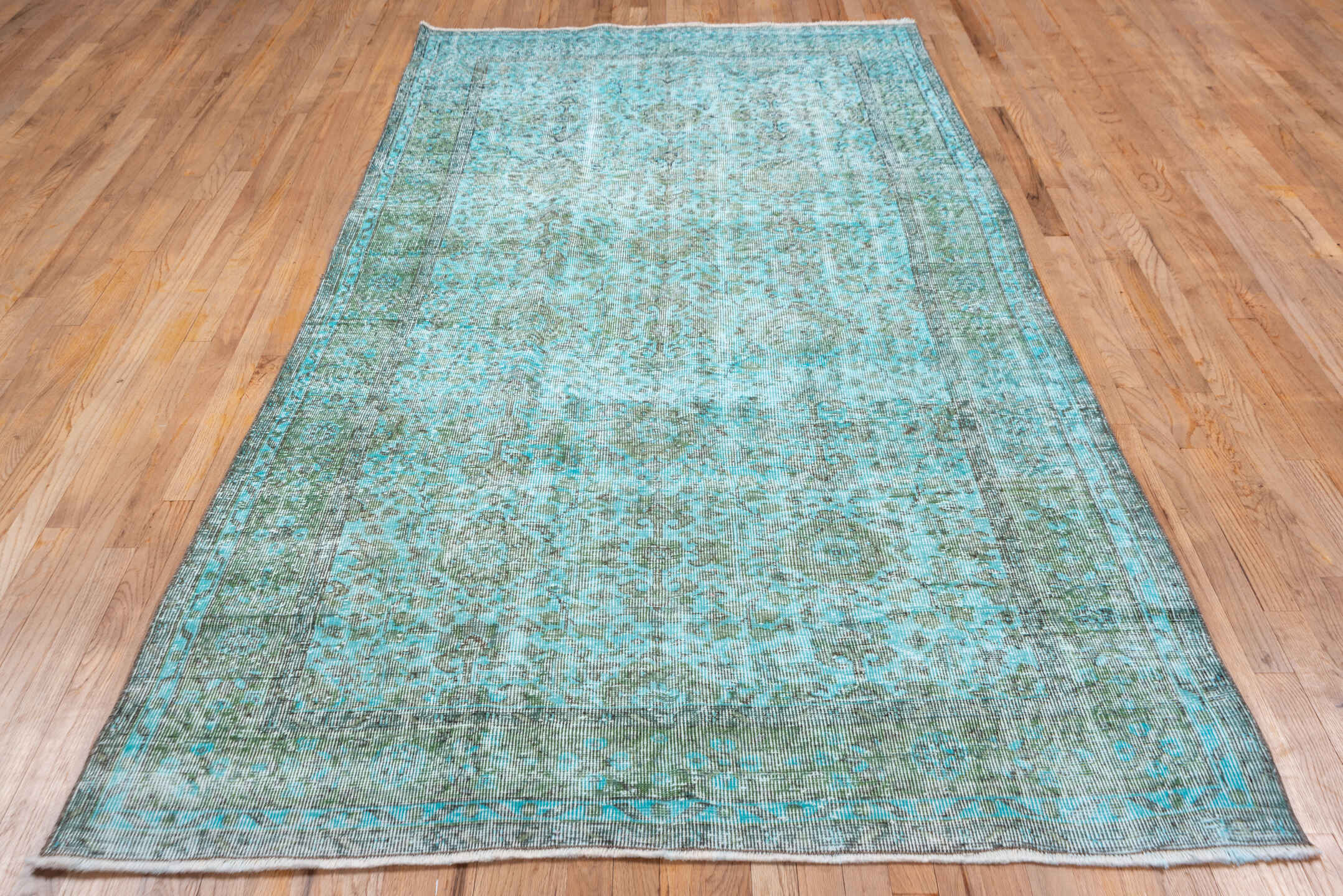 5' x 9' one-of-a-kind handmade antique Overdyed medium size rug. Color palette: aqua, ivory, sage, taupe, seafoam, pale gray