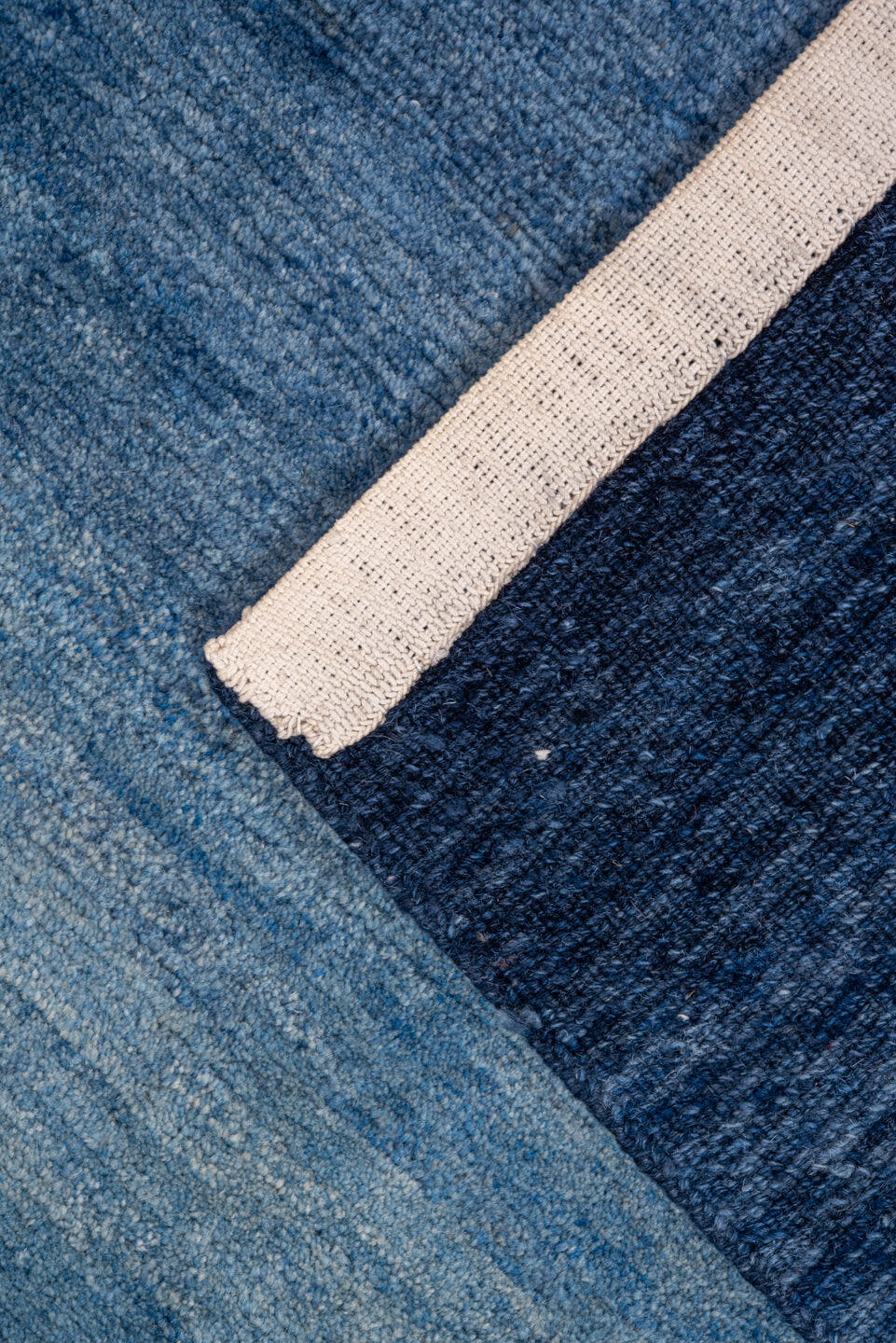5' x 6' one-of-a-kind handmade vintage Tibetan rug. Color palette: blue, navy, slate, sky blue, gray, light blue