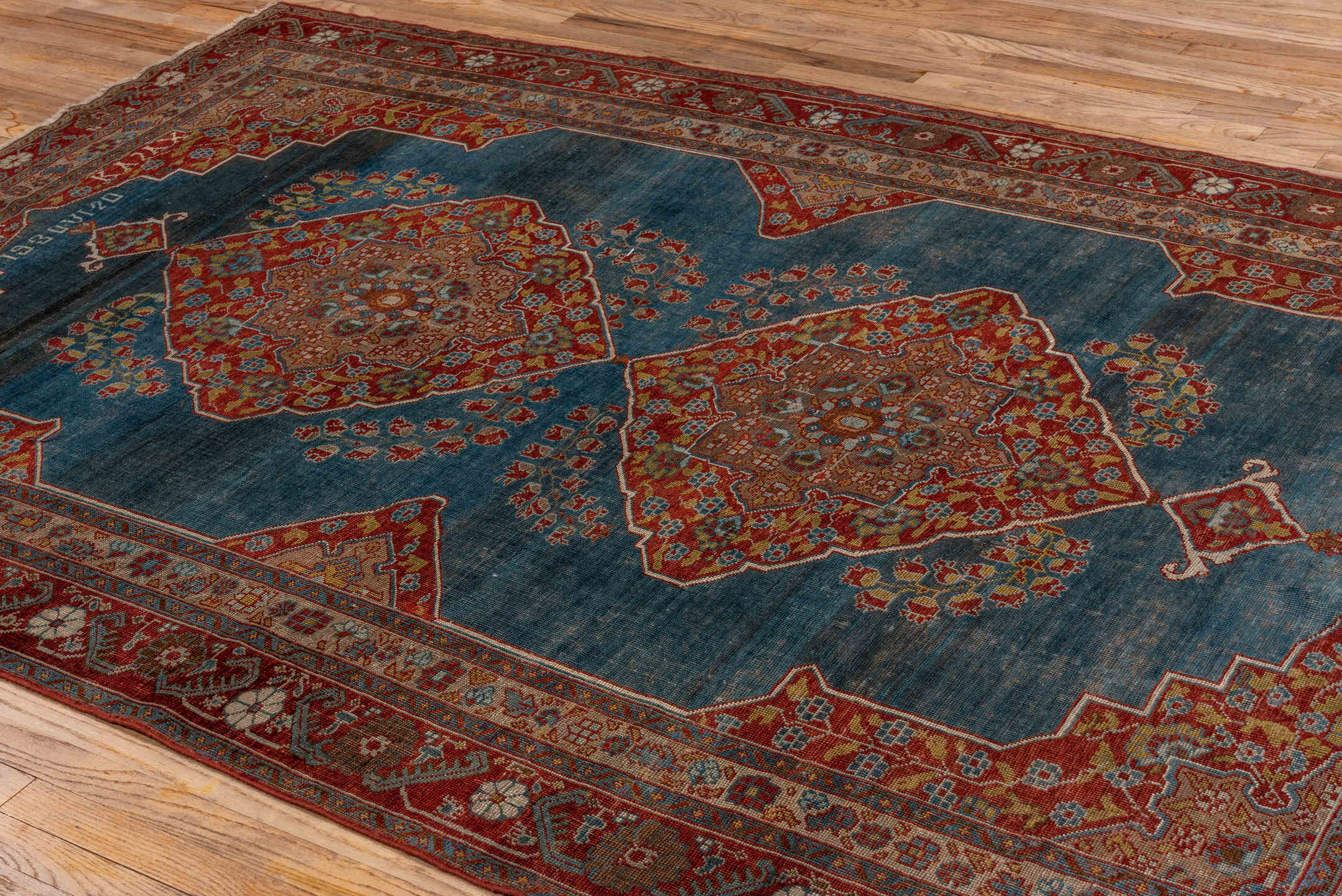 5' x 9' one-of-a-kind handmade antique Karabagh medium size rug. Color palette: turquoise, rust, ivory, terra cotta, gold