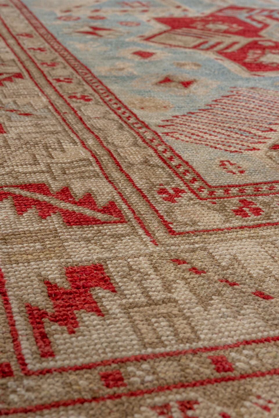 3' x 7' one-of-a-kind handmade antique Caucasian runner rug. Color palette: ivory, sky blue, rust, beige, camel, crimson